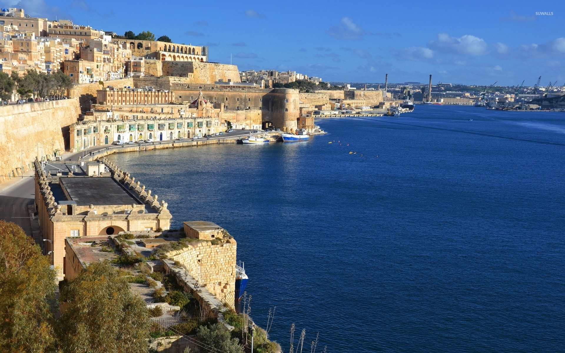City of Valletta guarded by a stone frotress wallpaper