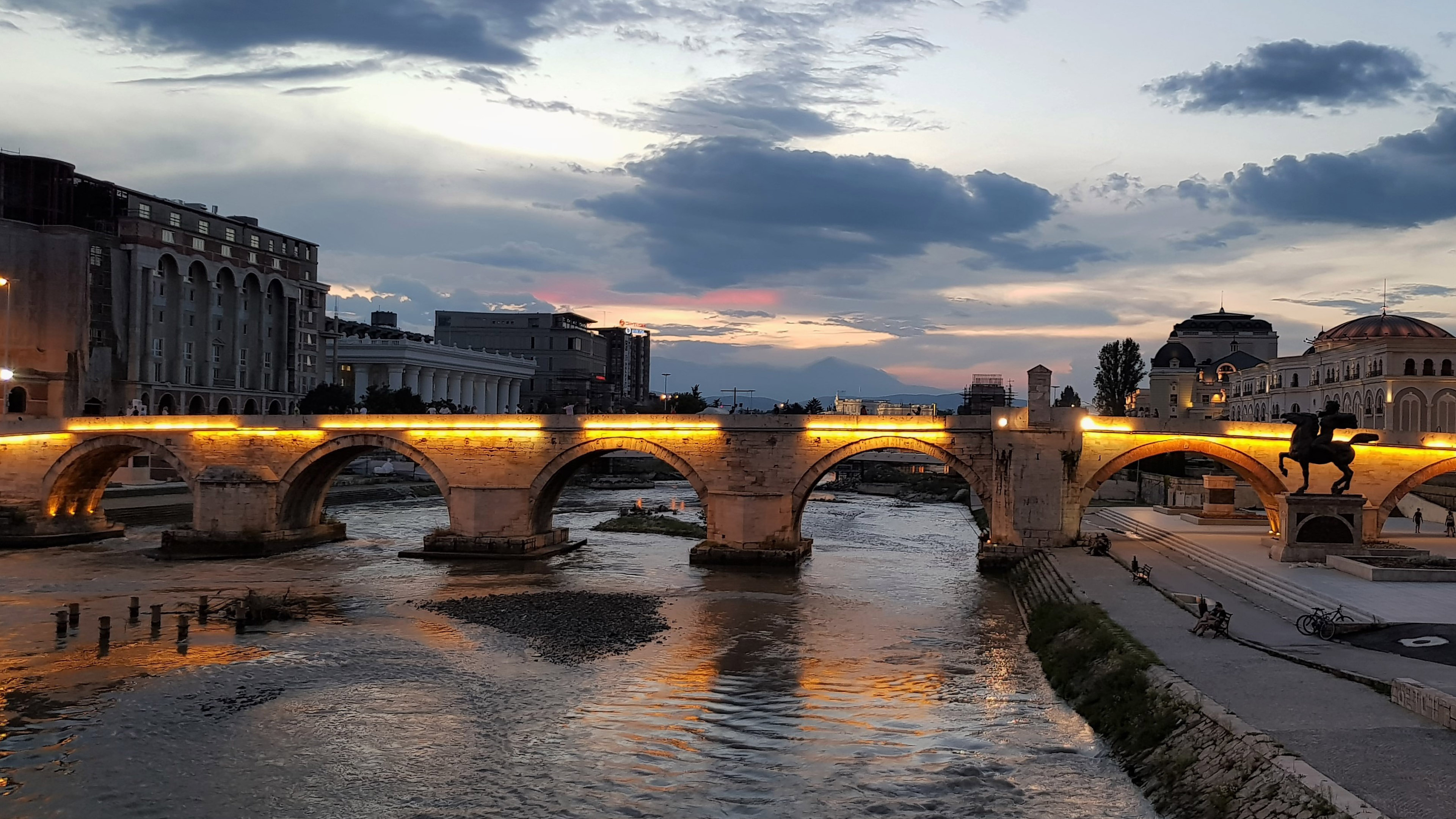 Beautiful Night View of Stone Bridge over Vardar River in Skopje