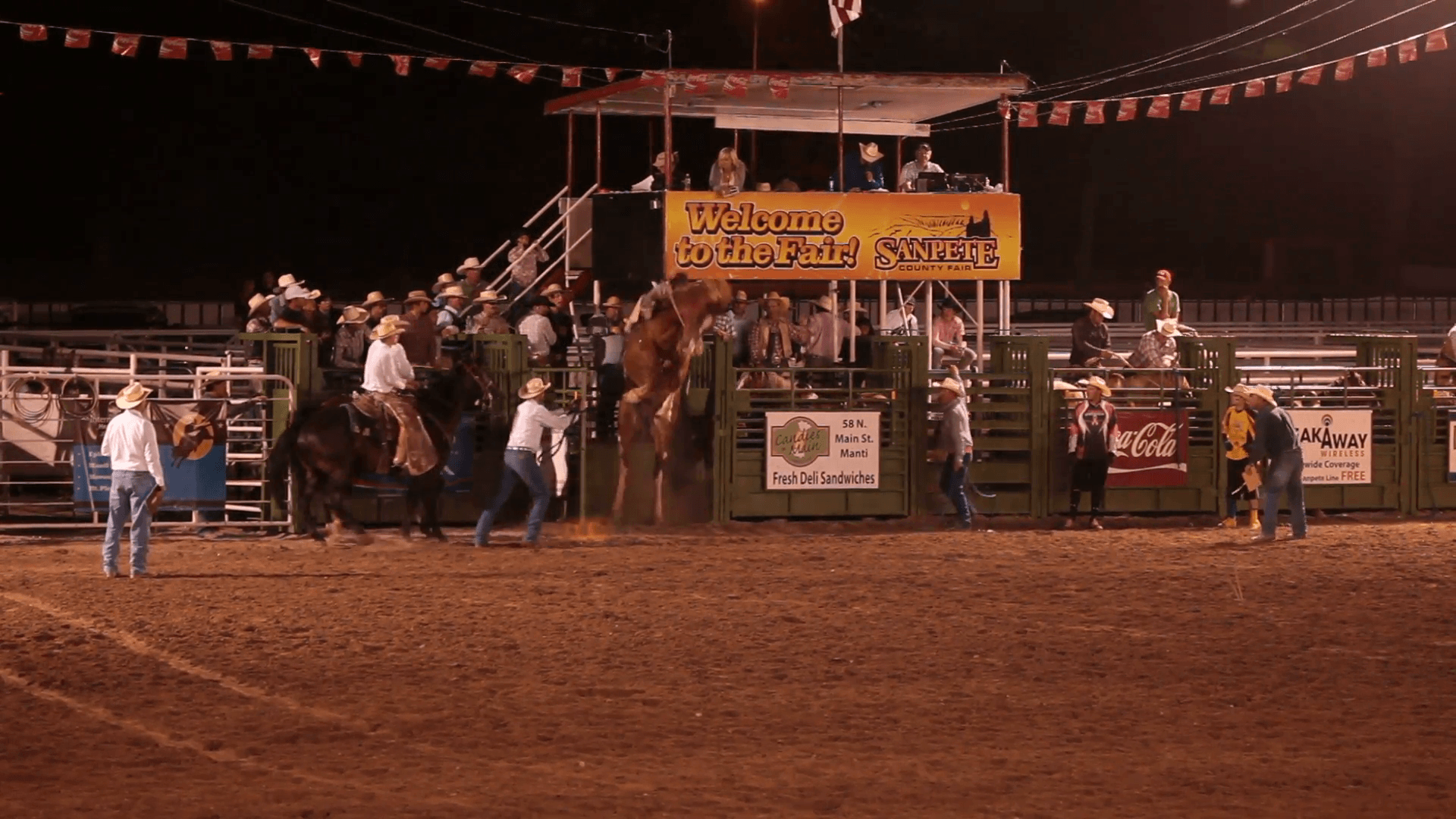 Rodeo saddle bronco horse ride gets rough ride out of chute to score