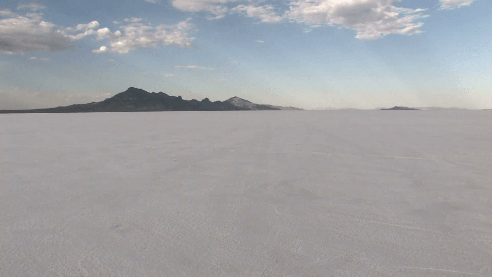 Speeding on Bonneville Salt Flats away Utah M HD Stock Video Footage