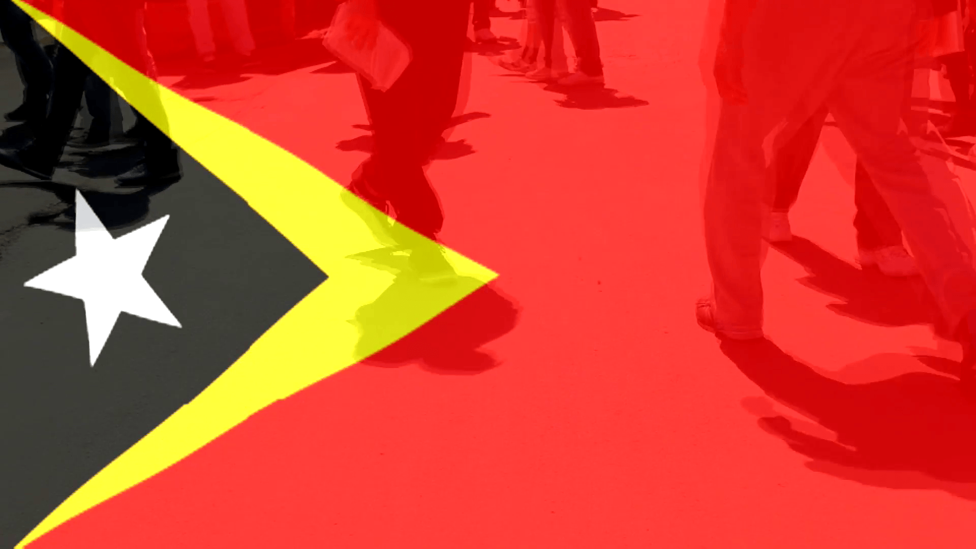 Timor Leste State Flag Waving And People Walking In The Background