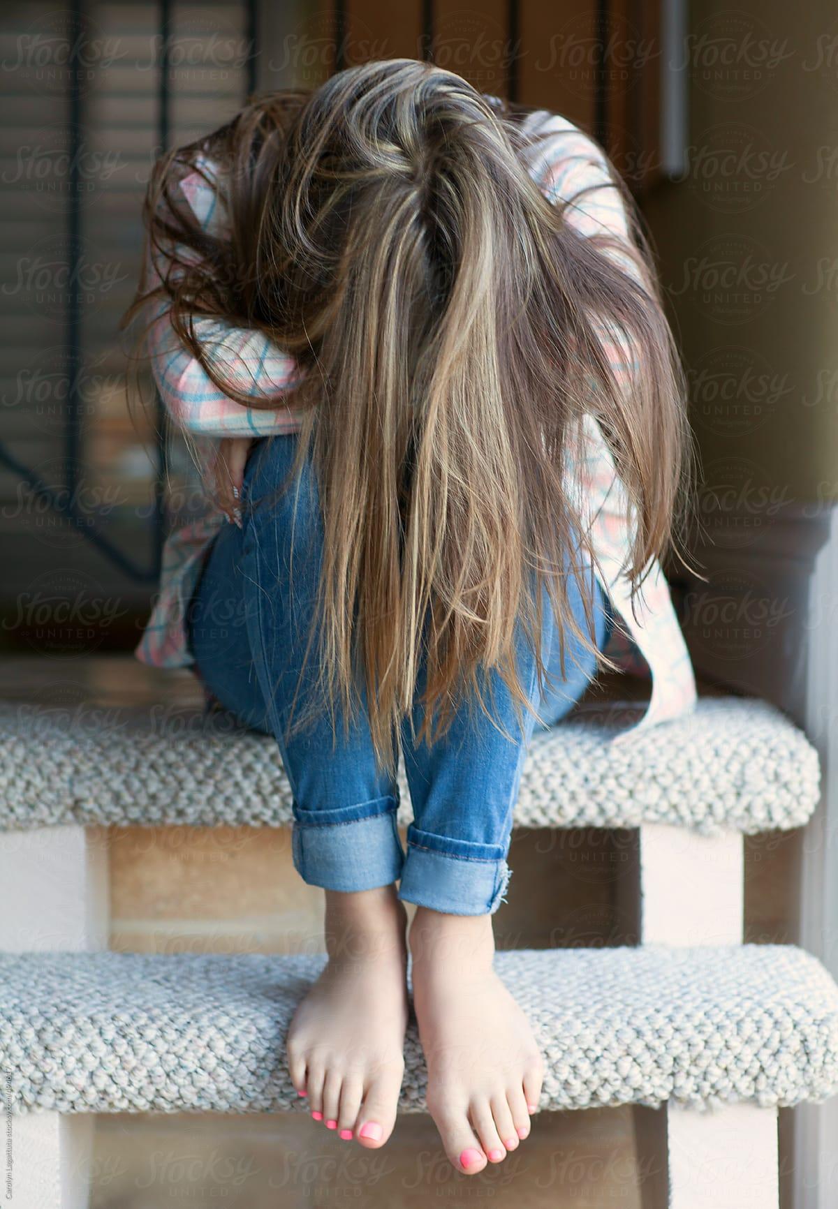 Teenage Girl With Long Hair Down Hiding Her Face