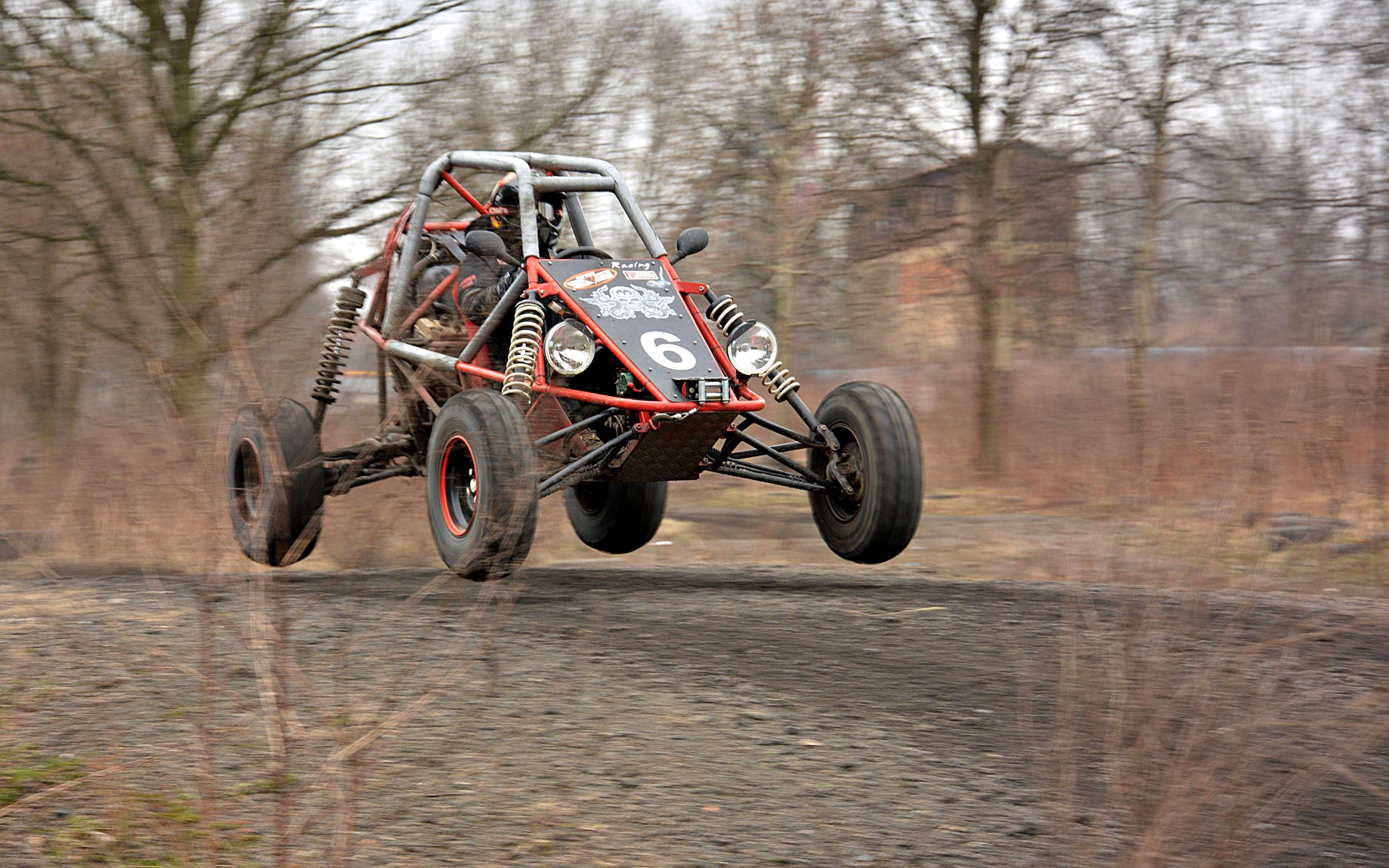 red and black dune buggy free image