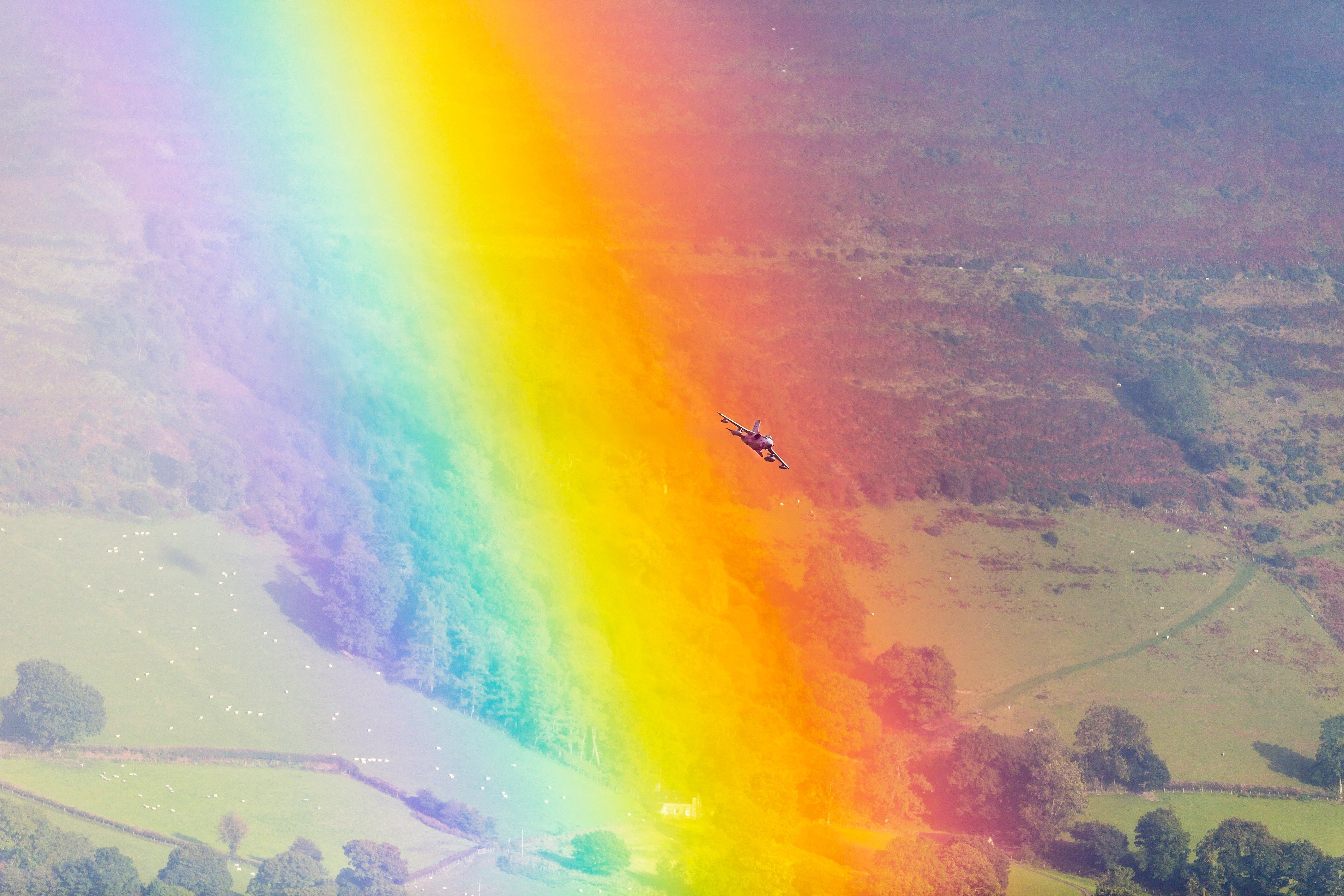 A Royal Air Force GR Tornado Soars Through a Rainbow in the Cambrian