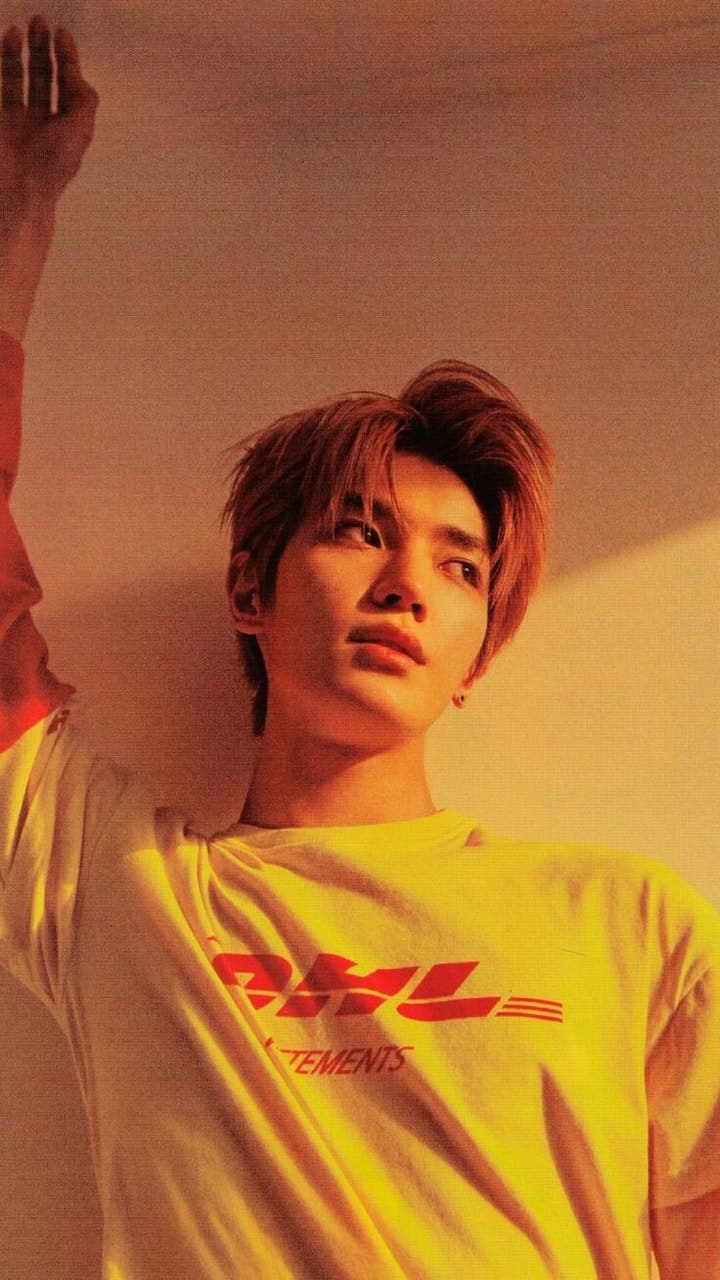 Taeyong is wallpaper material discovered by A f t e r a e s ♡