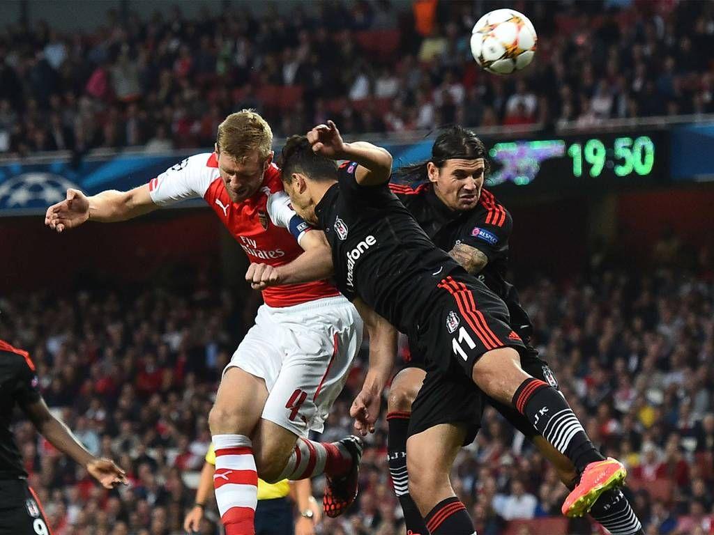 Per Mertesacker In Action Against Besiktas. Photo: Ben Stansall AFP