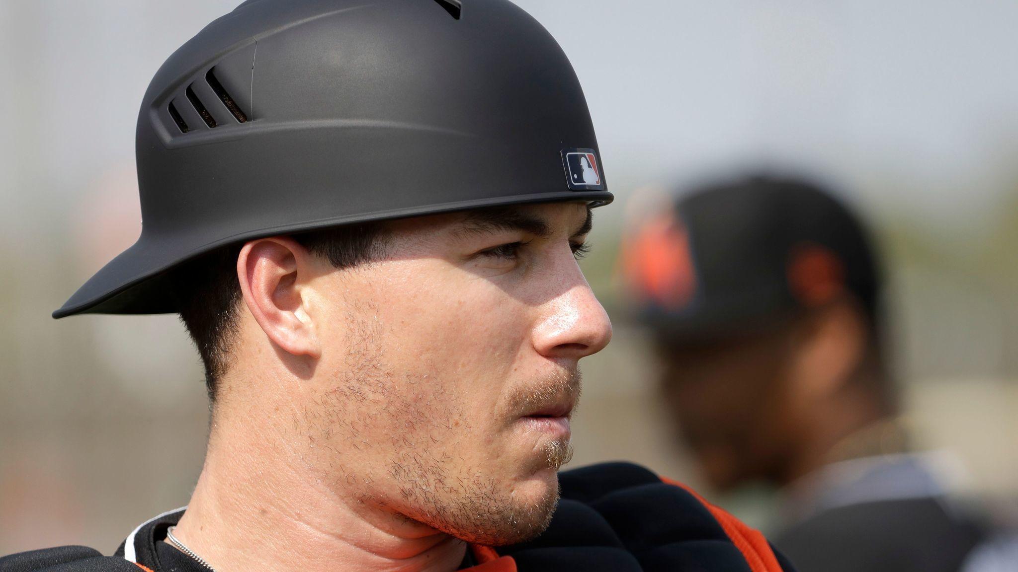 Playing first base? That's nothing for J.T. Realmuto, former QB