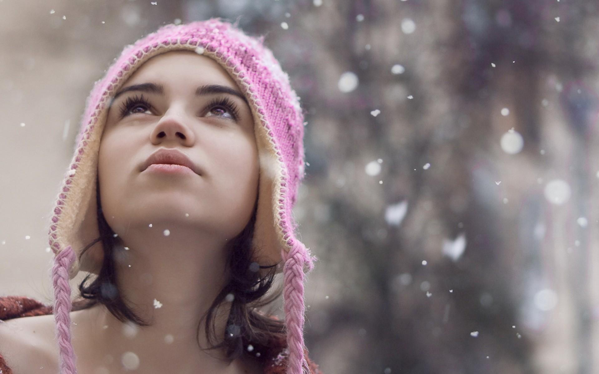 Snowflakes Falling on Girl's Face widescreen wallpaper. Wide