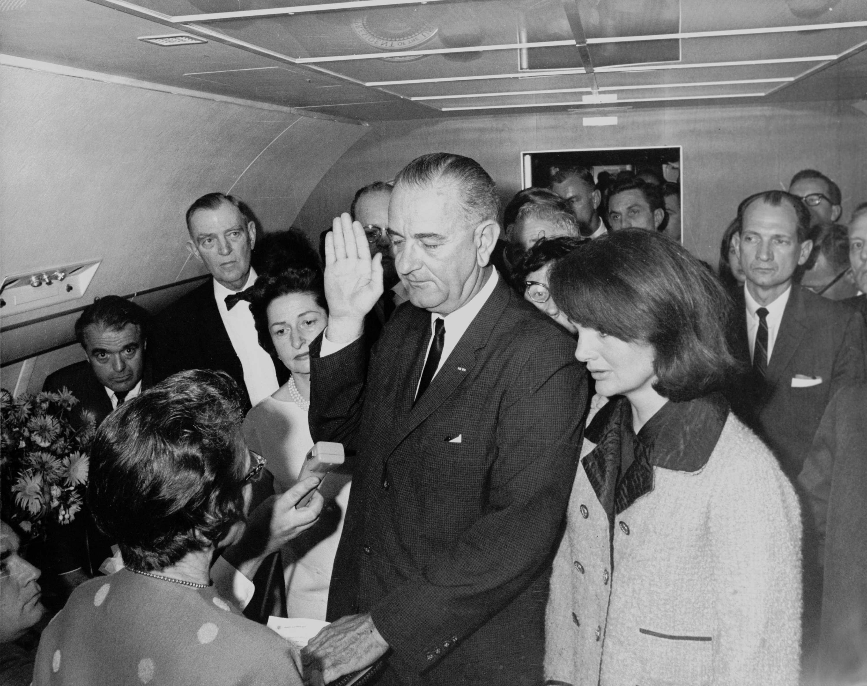 Lyndon B. Johnson taking the oath of office, November