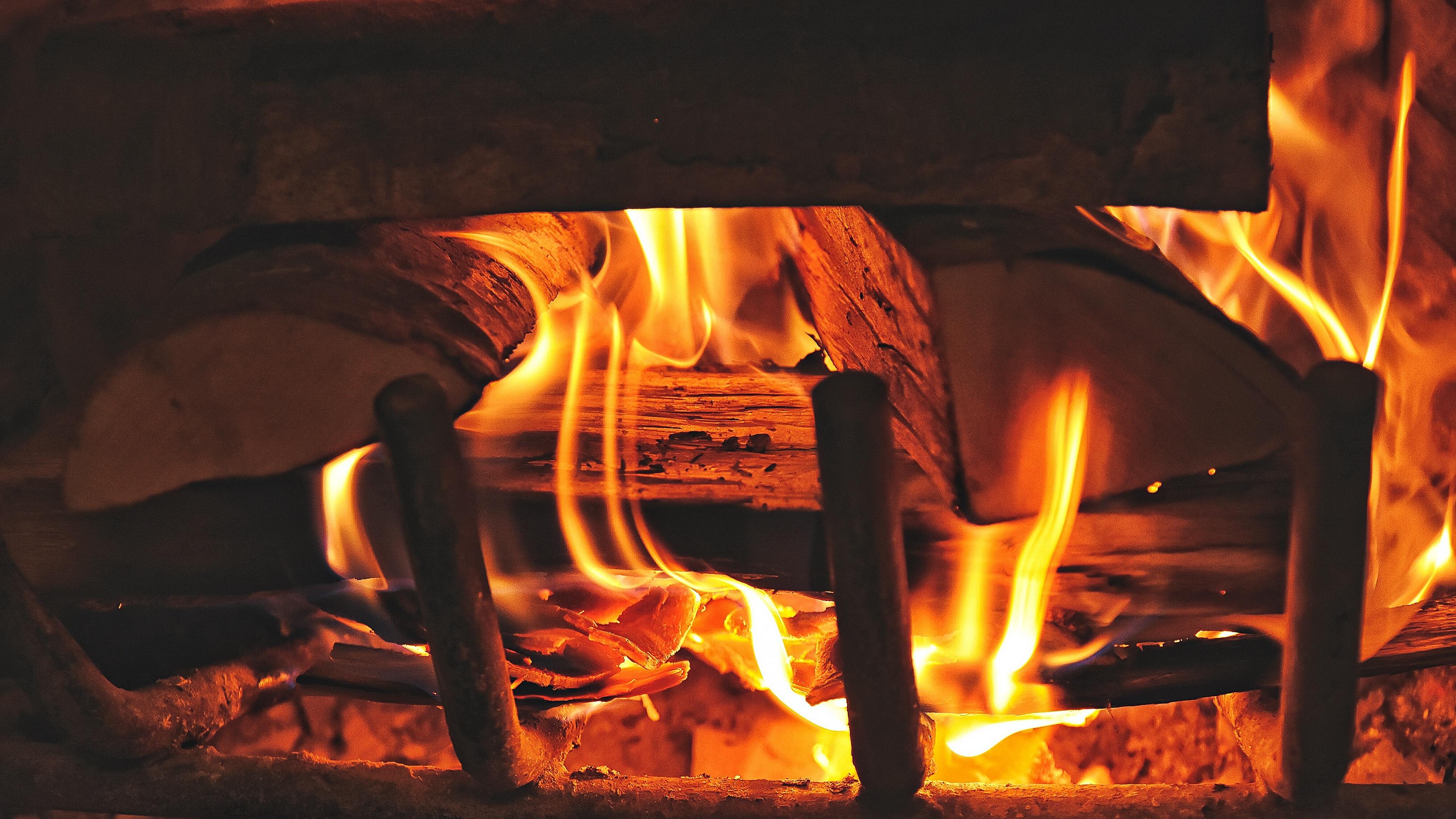 Download wallpaper 3840x2160 fireplace, fire, firewood 4k uhd 16:9