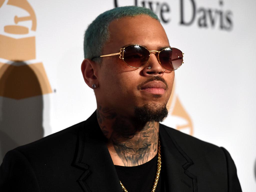 Chris Brown denies rape charges after release from jail. Business