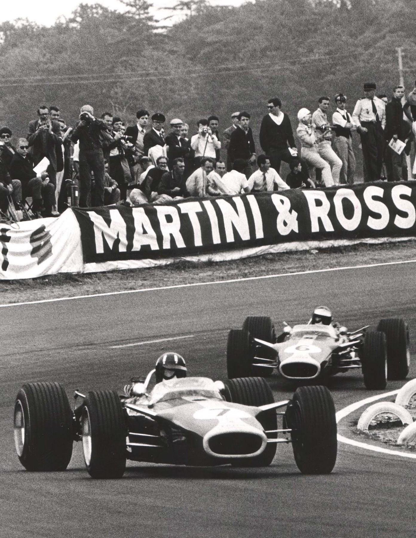 Jim Clark and Graham Hill dueling in their Lotus 49s during the 1967