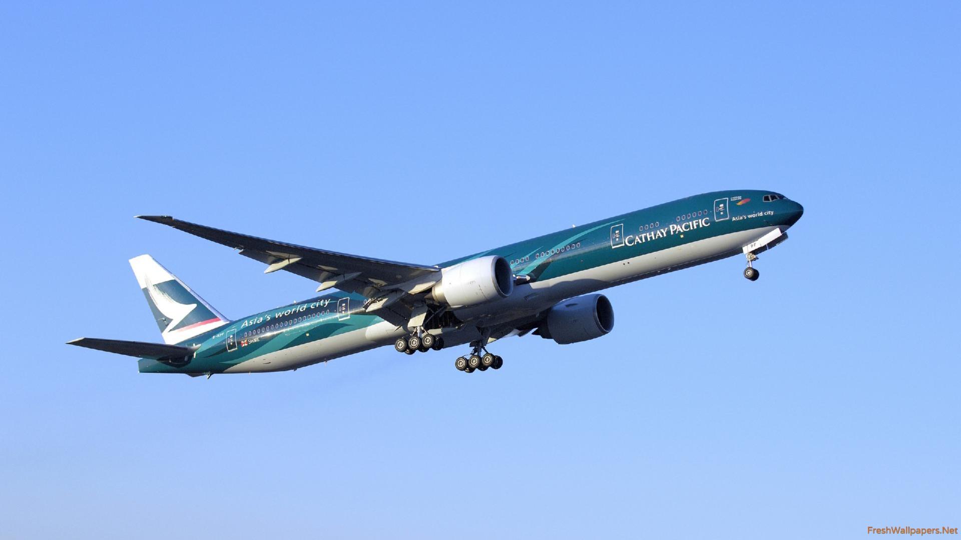 Cathay Pacific Boeing 777 in flight wallpaper