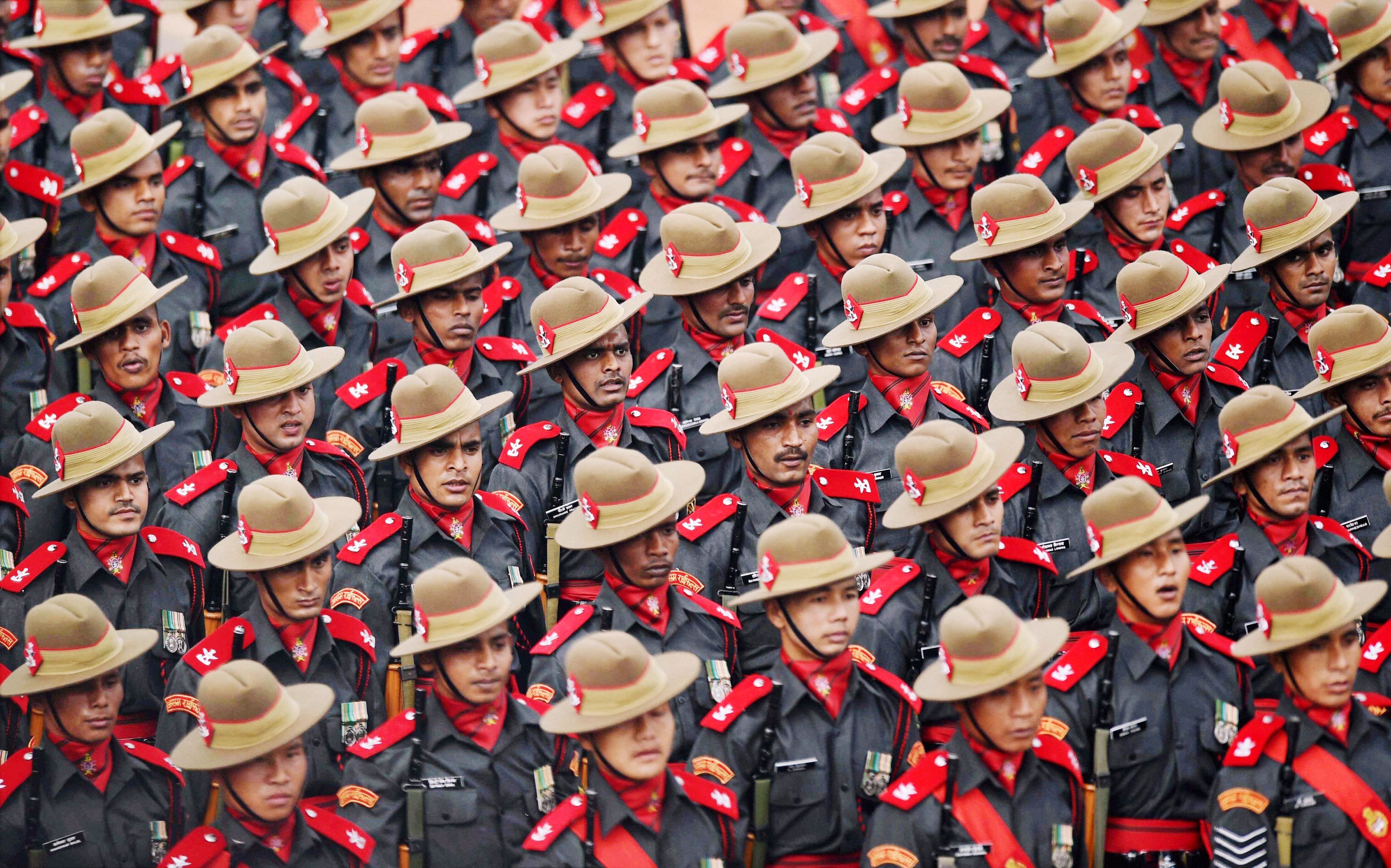 Paramilitary soldiers march during the full dress rehearsal for