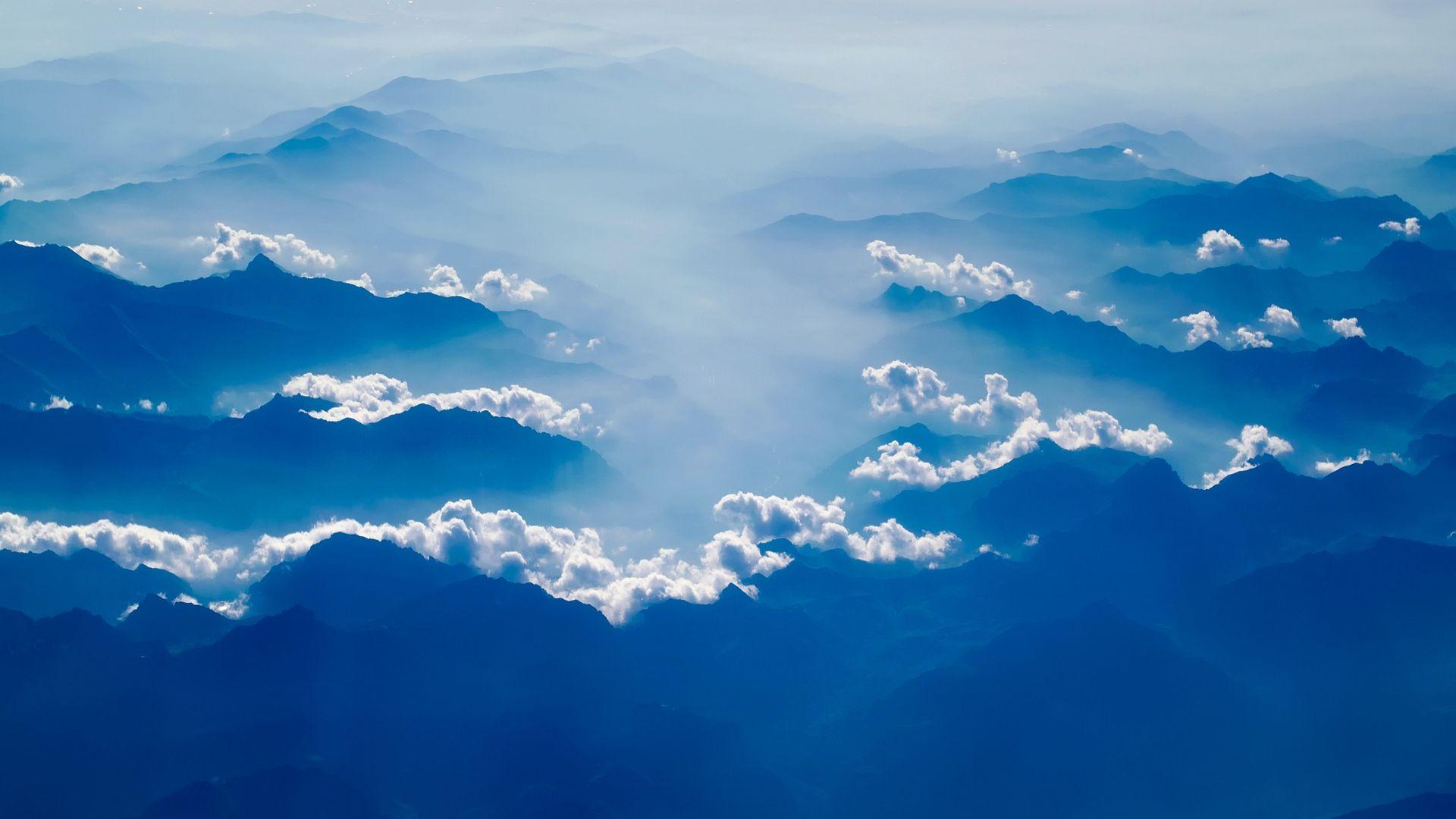 Cloudy Foggy Mountains Wallpaper