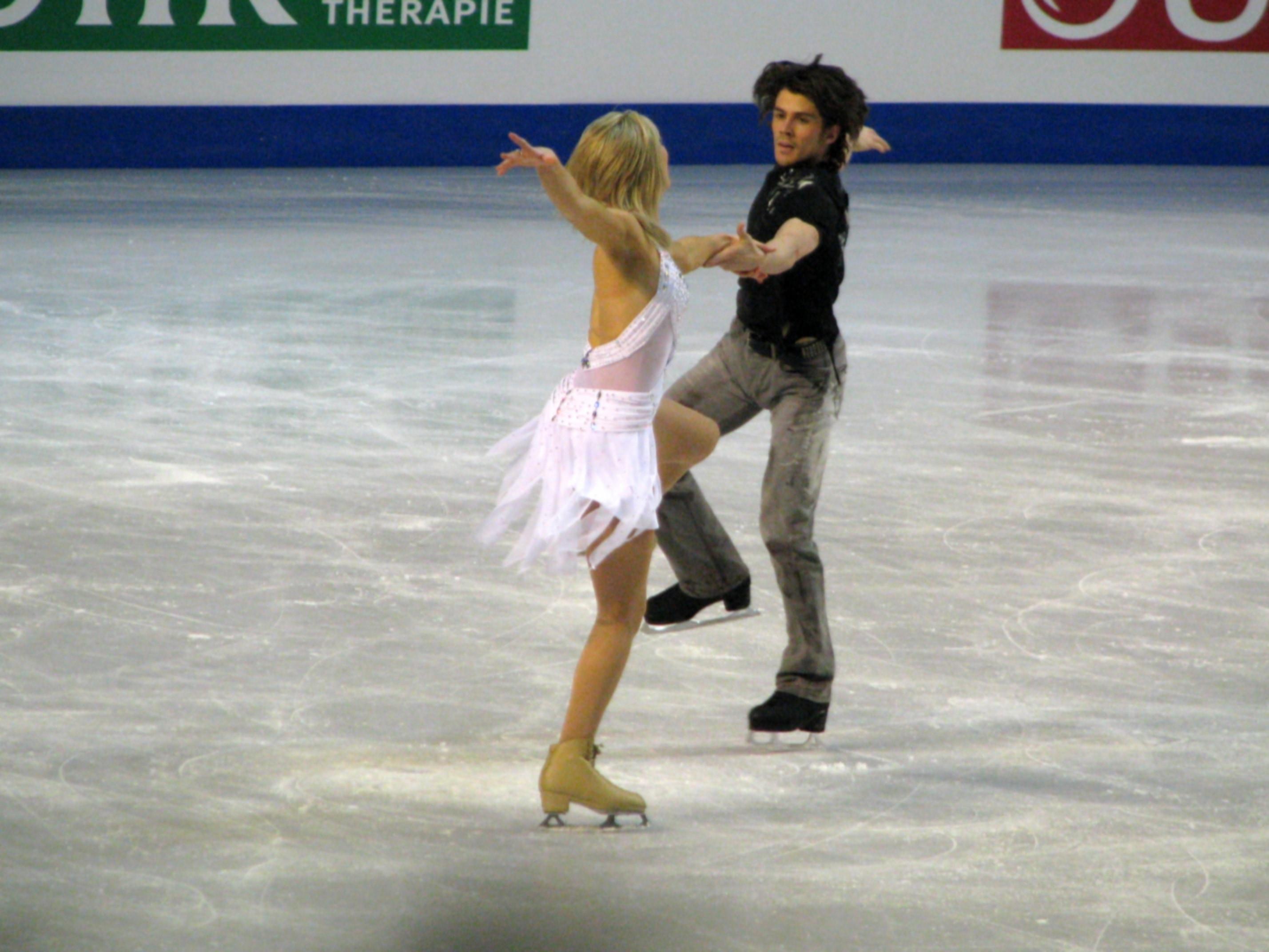 woman and man ice skating free image
