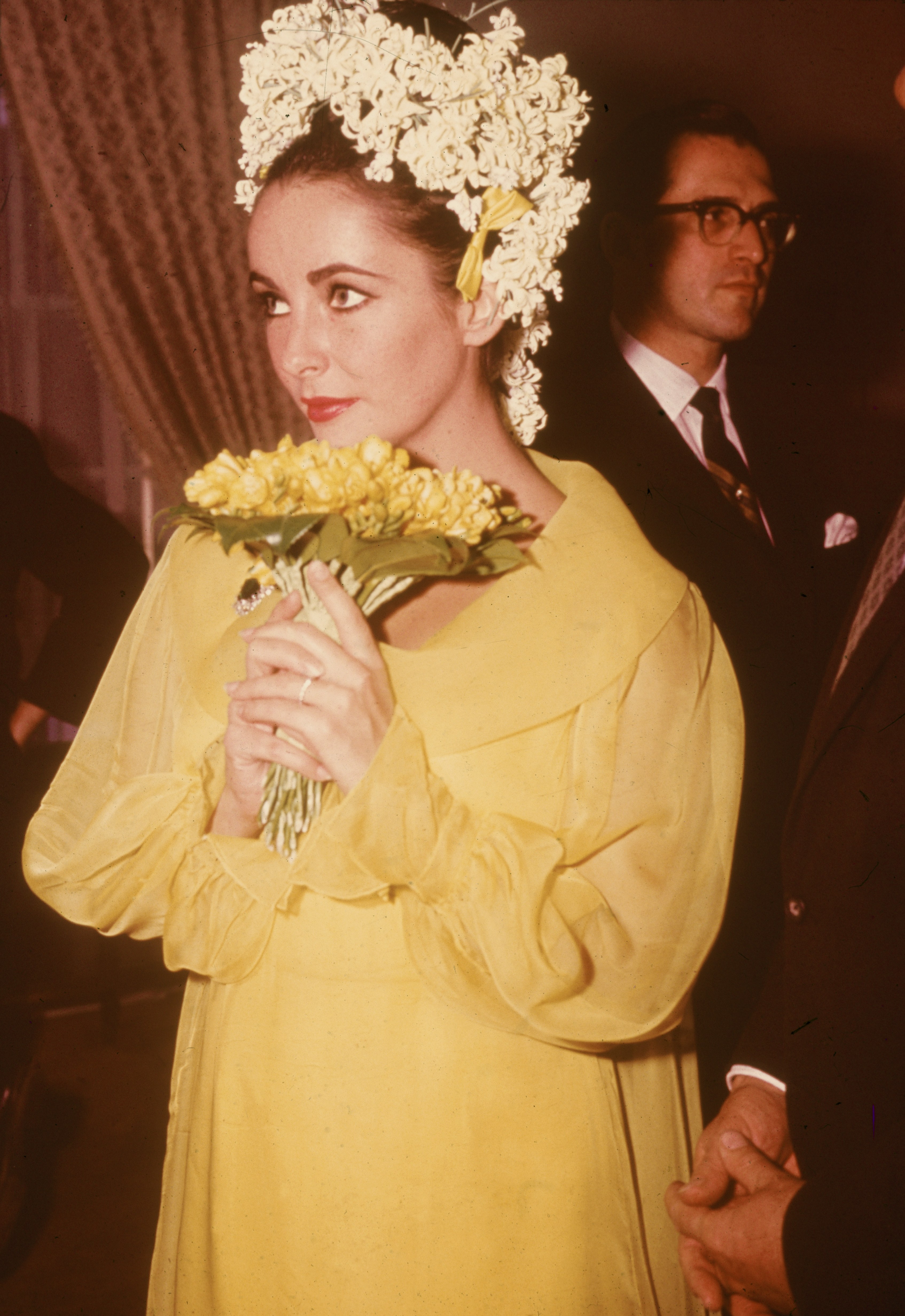 Elizabeth Taylor's 8 Wedding Dresses in Photo