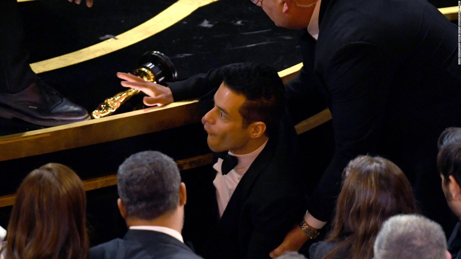 Rami Malek falls off stage at Oscars