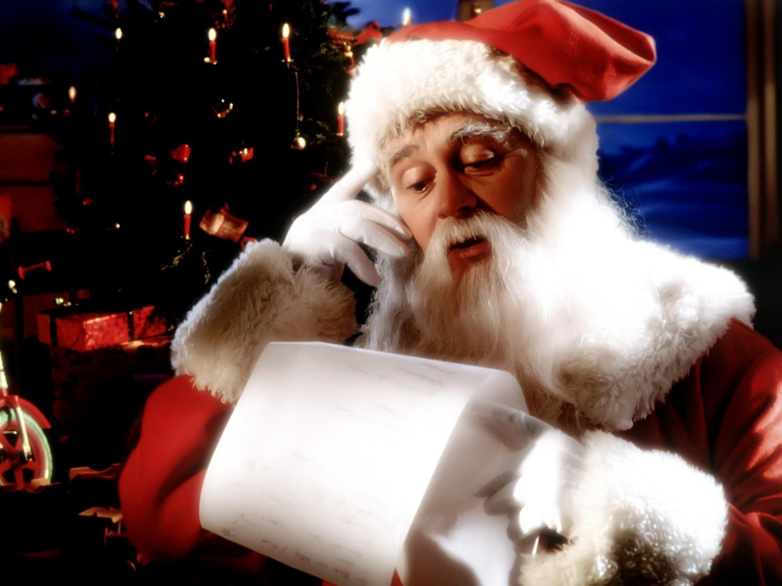 Santa Claus Reading Christmas Holidays Wallpaper