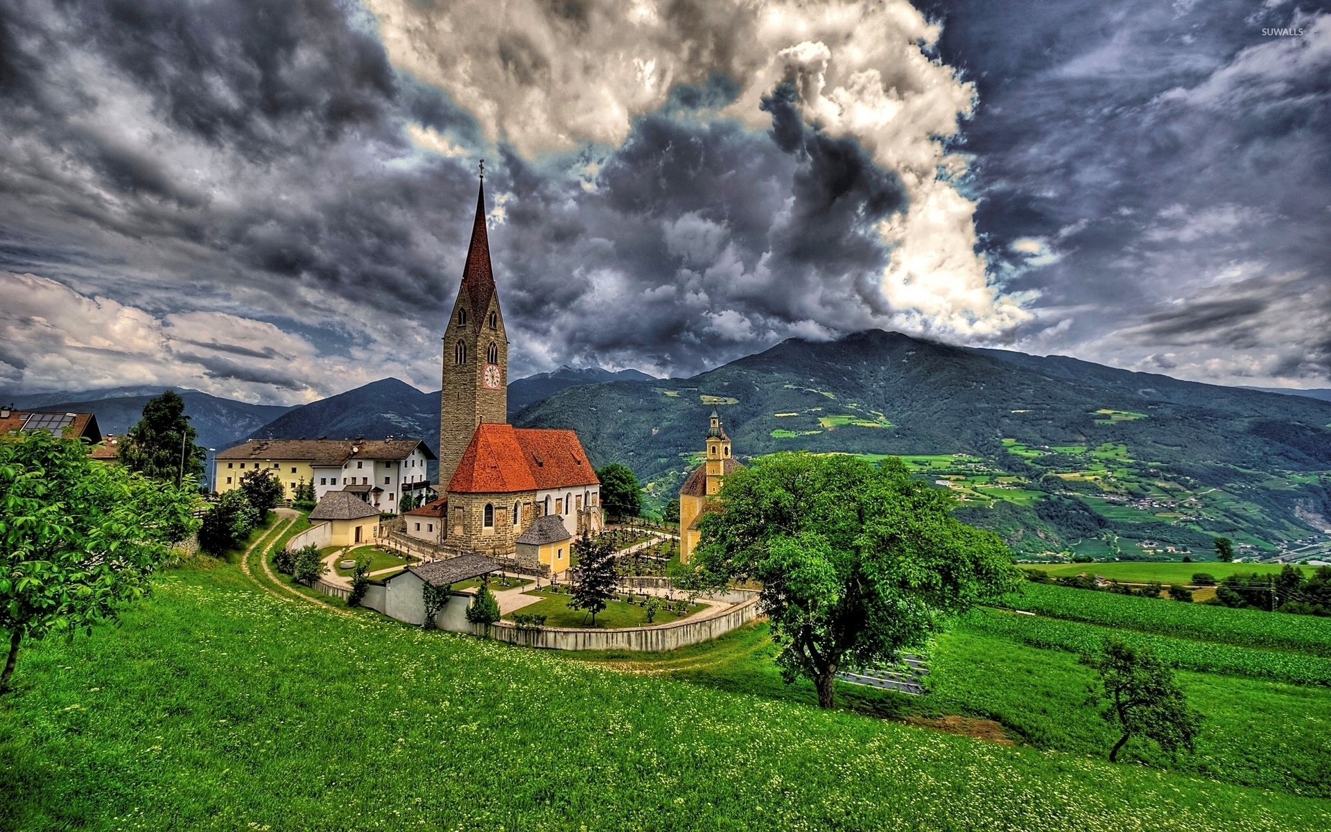 Stone church in an italian small town wallpaper wallpaper
