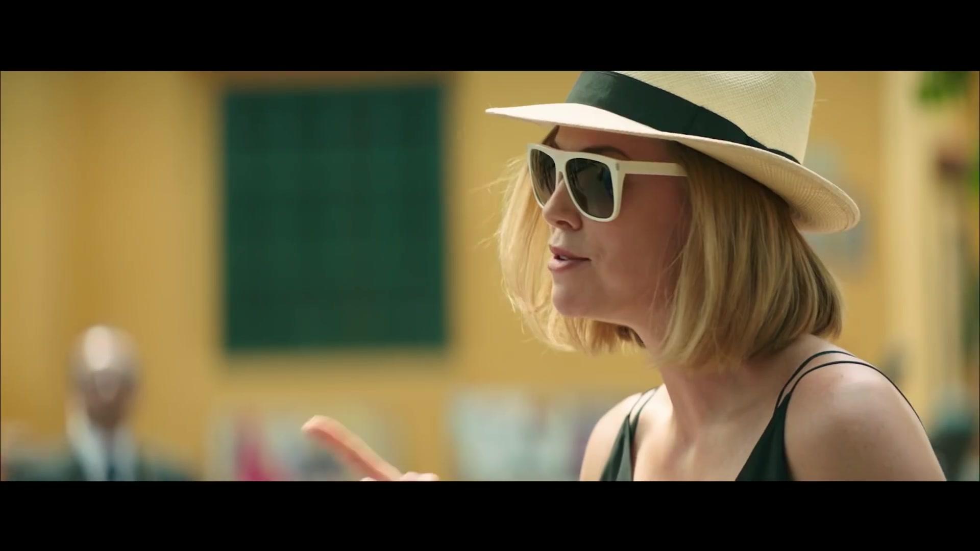 Sunglasses With White Frame Worn by Charlize Theron in Long Shot