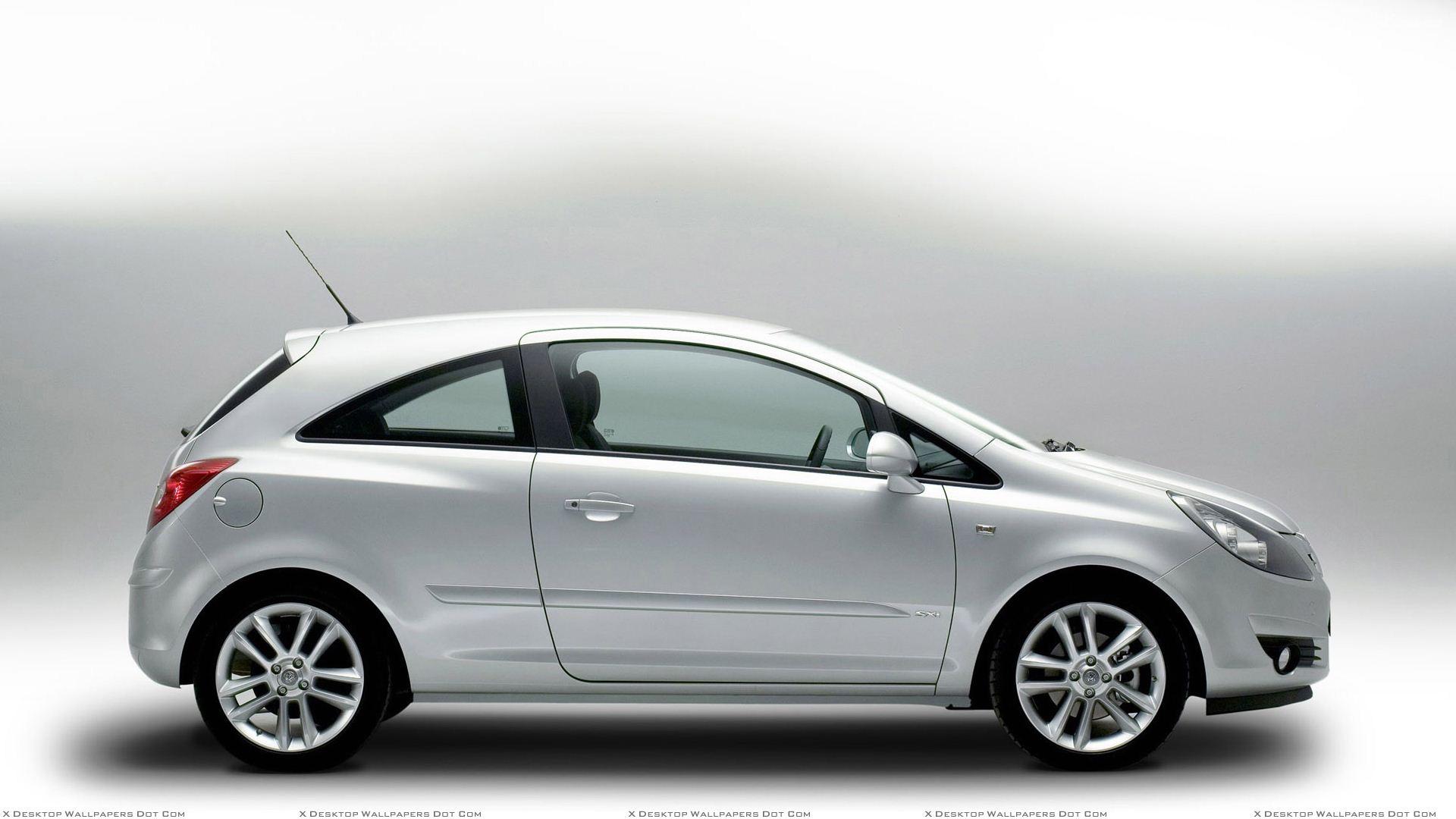 Side Pose Of Vauxhall Corsa In Silver Wallpaper
