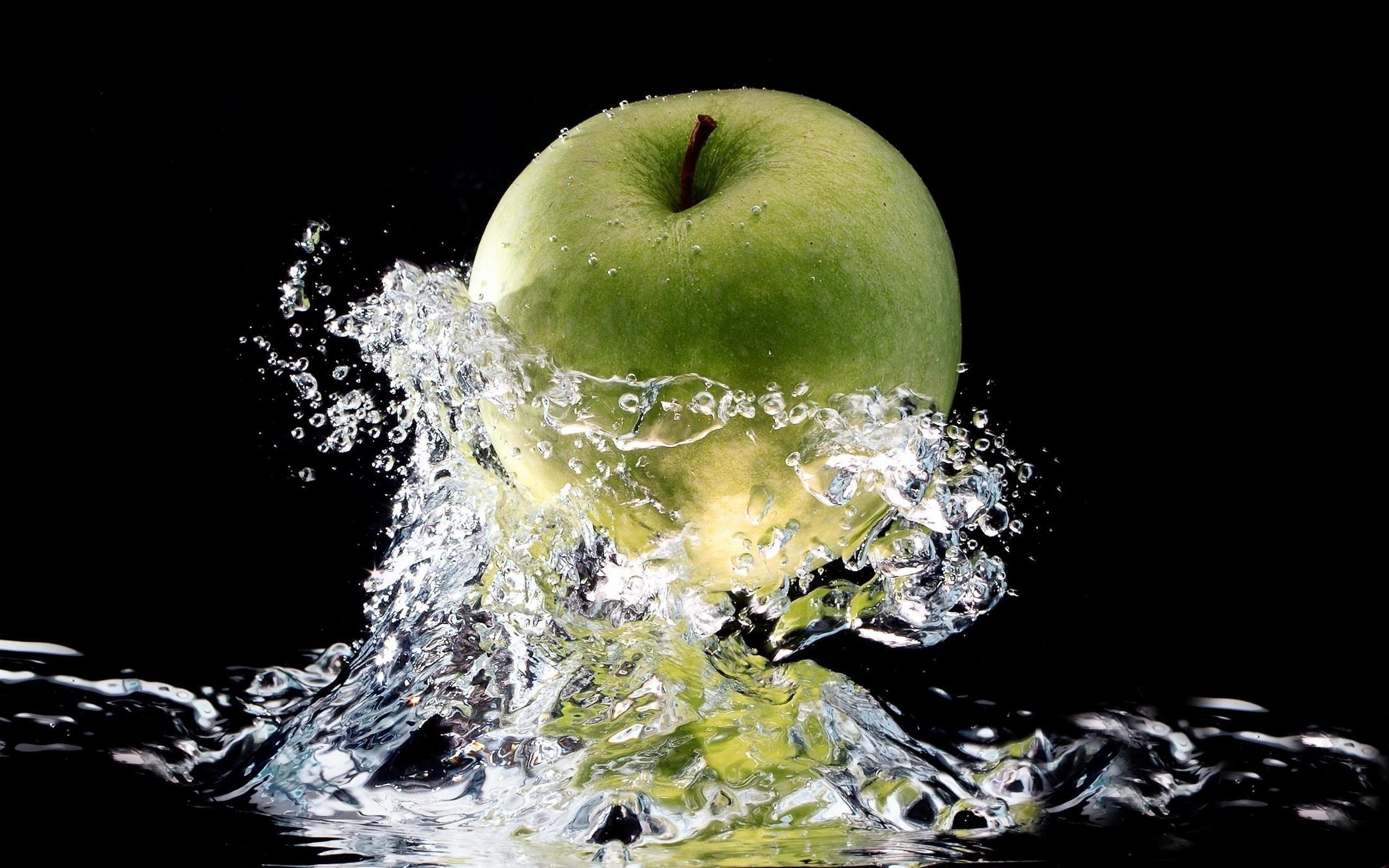 Green apple in a splash of fresh water Fruit Water Photography Apple