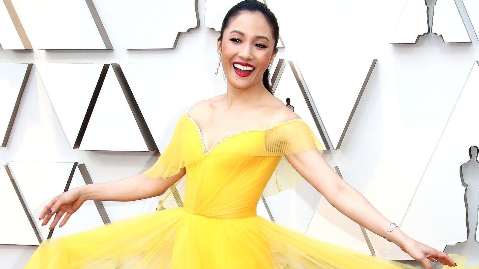 Constance Wu's Yellow Oscars 2019 Dress Nod to Coldplay Song