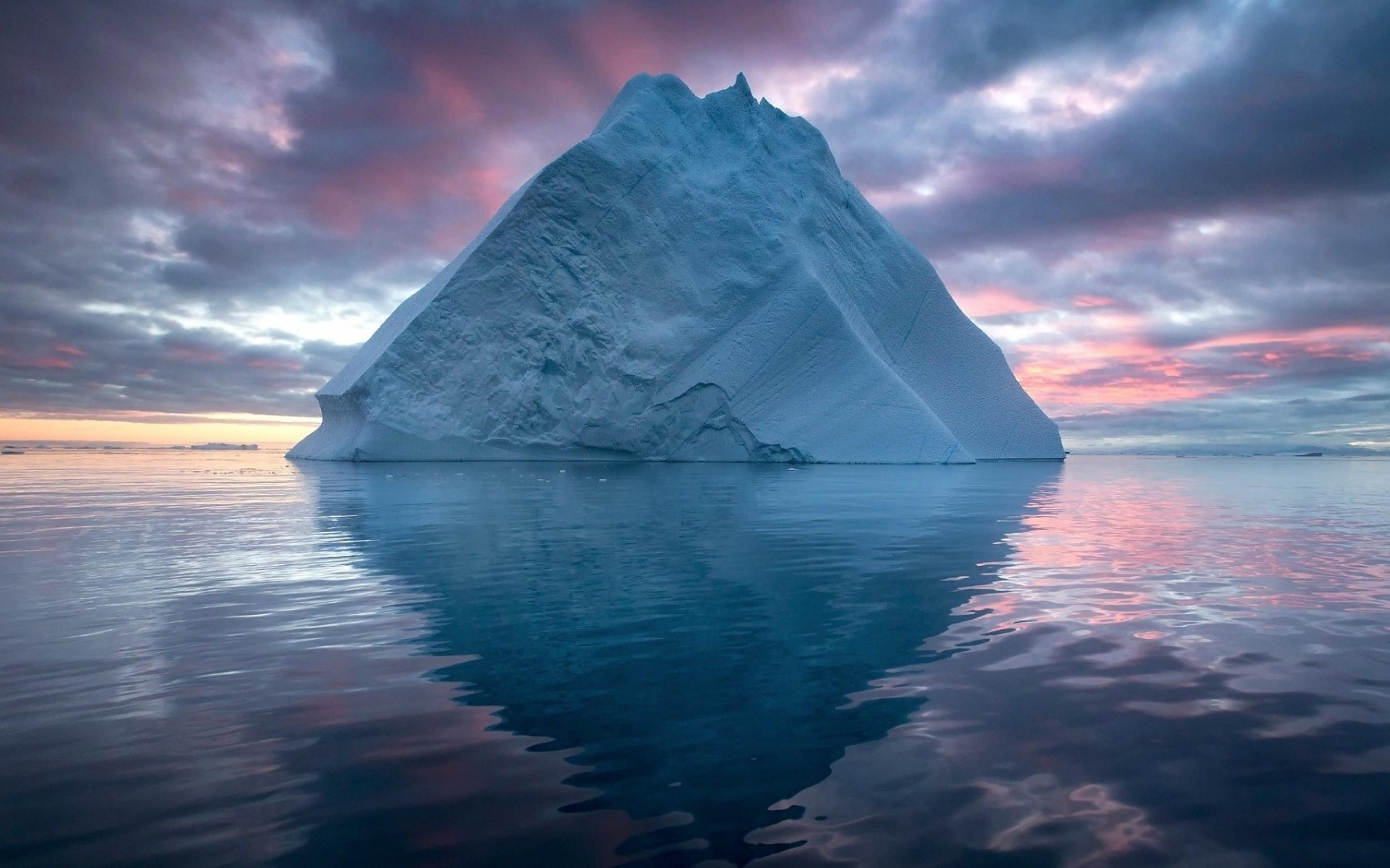Download 2880x1800 Iceberg, Ocean, Dark Clouds, Arctic Wallpaper