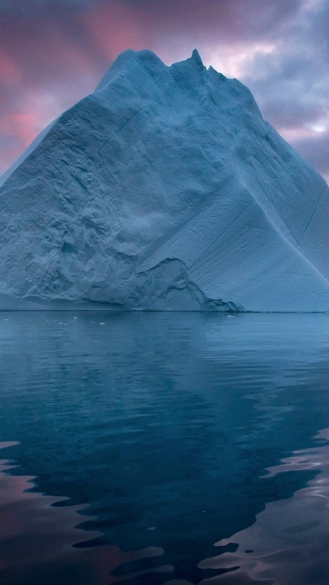 Download 1080x1920 Iceberg, Ocean, Dark Clouds, Arctic Wallpaper