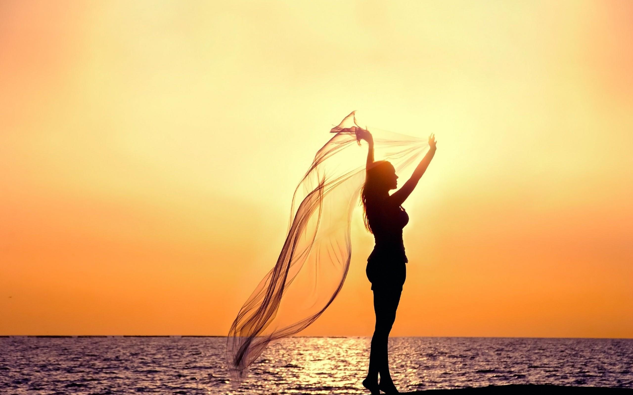 Woman with Veil in the Sunset on the Beach widescreen wallpaper
