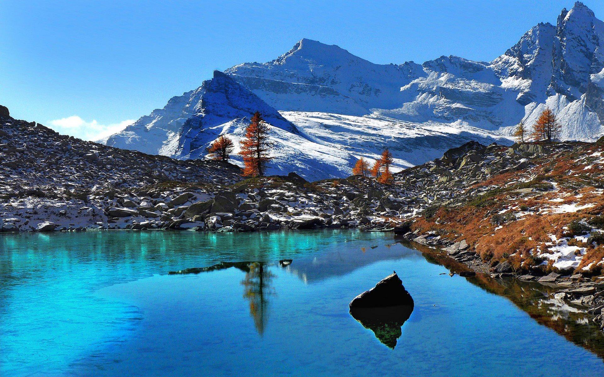 Download wallpaper snow, blue sky, winter, piedmont, mountain lake