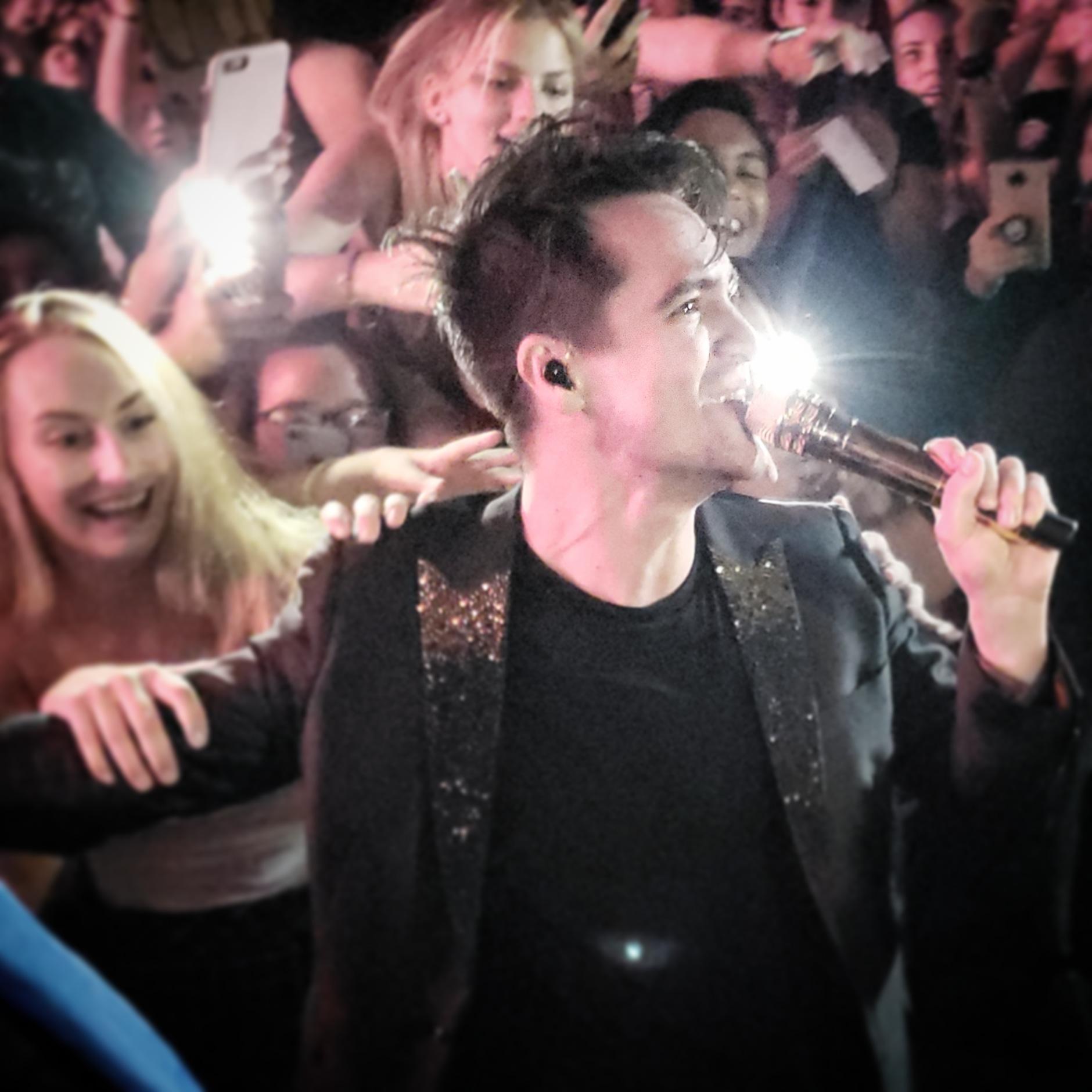Brendon Urie image Brendon walking the Crowd. HD wallpaper