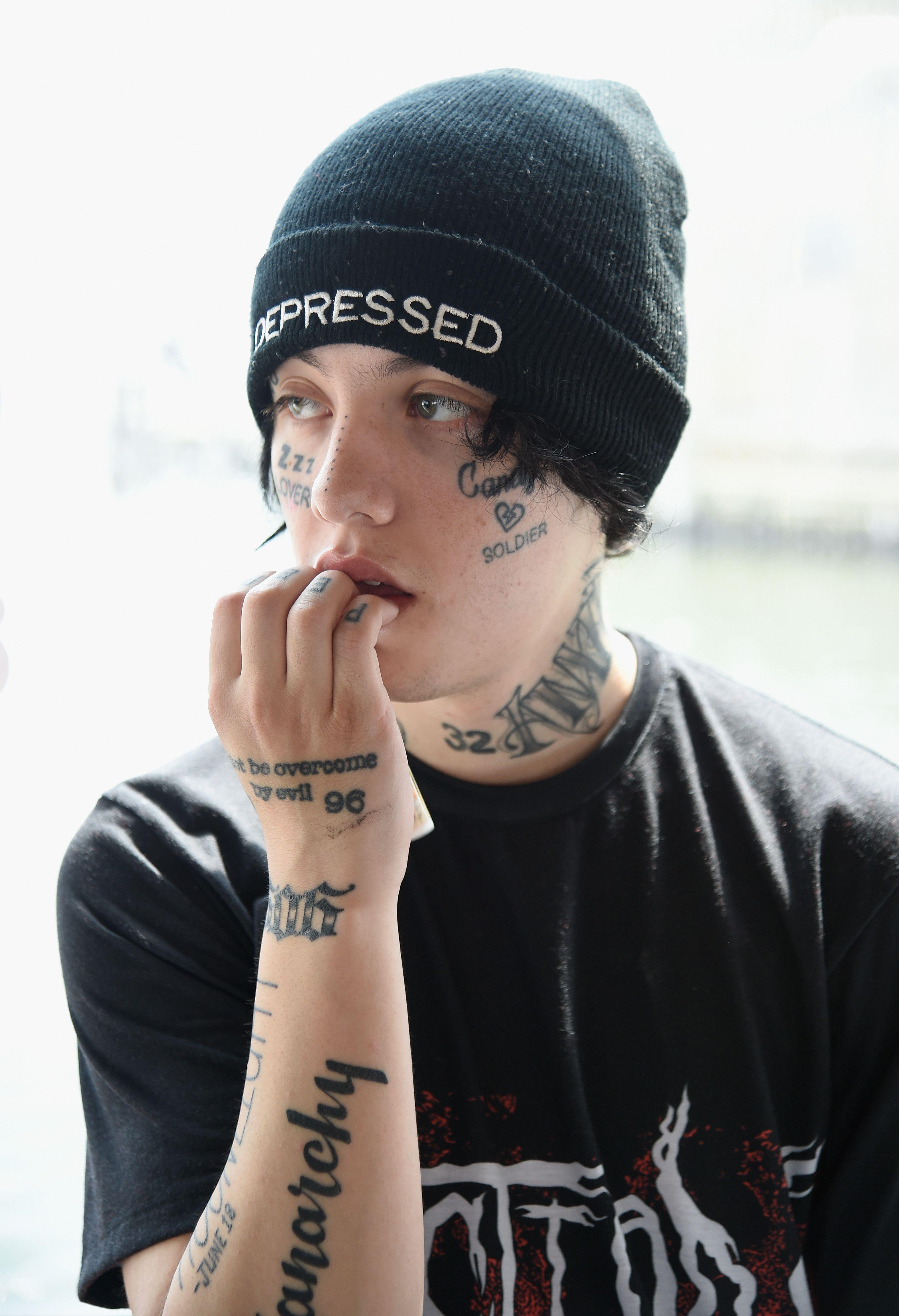 Lil Xan's Face Tattoo Meanings and Picture Lil Xan's 11 Face