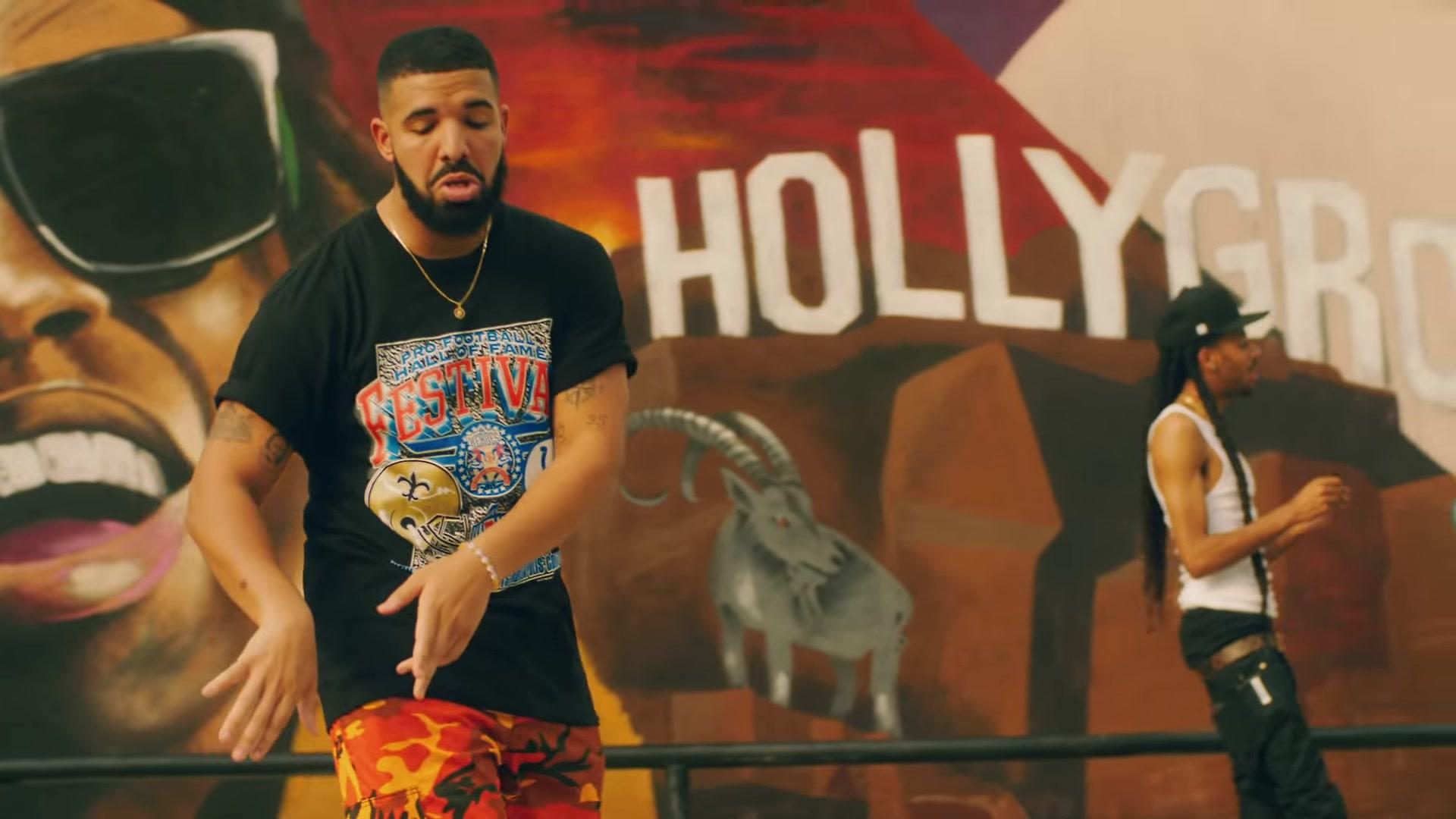 Drake wears Superbowl 44 Saints vs Colts Shirt in In My Feelings