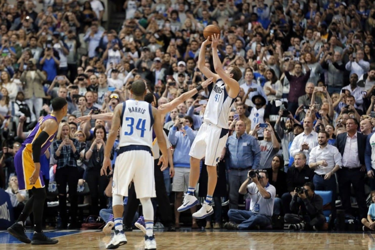 Dirk Nowitzki reaches 000 points, and it comes in the most