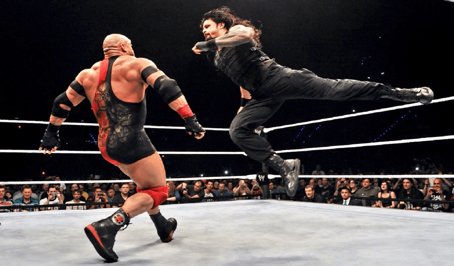 WWE Wallpaper High Definition Wallpaper: Superman Punch By Roman Reigns To Rayback