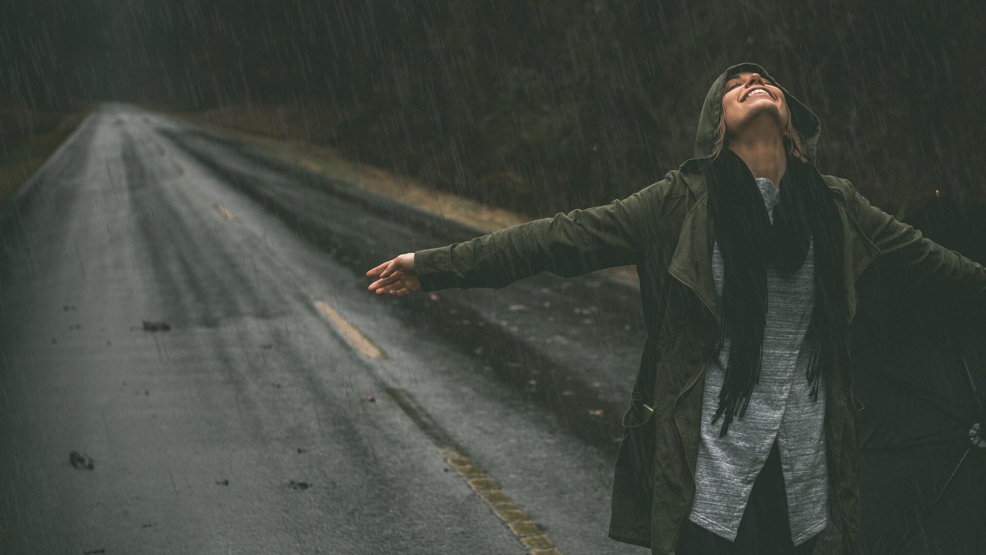 Girl Enjoying Rain on Street HD Wallpaper