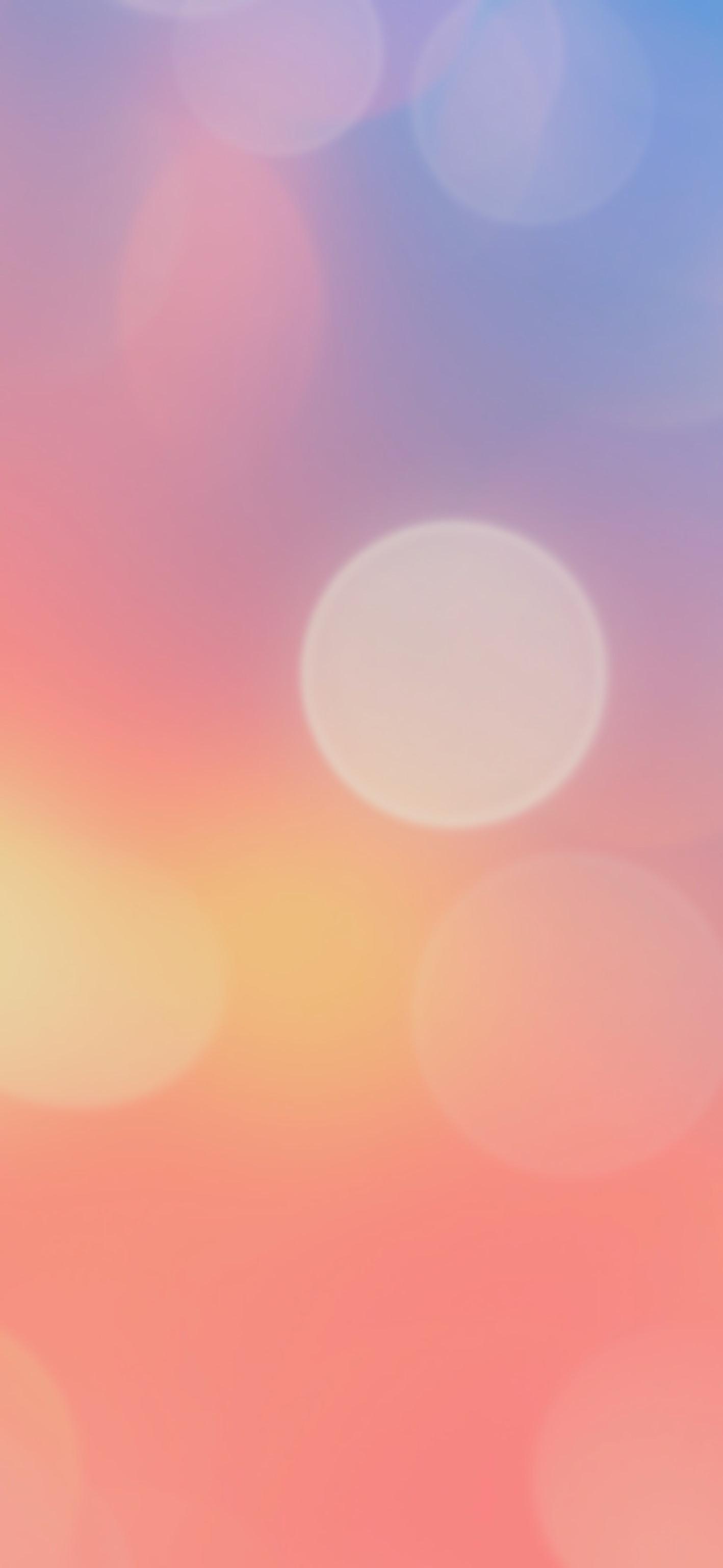 A bokeh gradient wallpaper I made for the iPhone X home screen