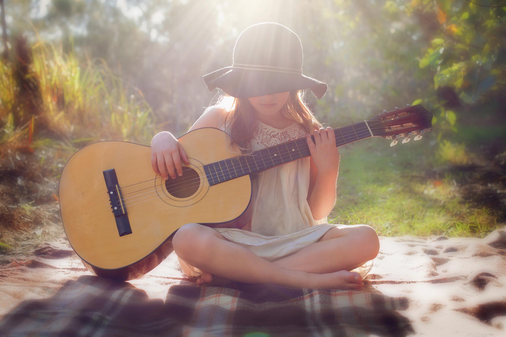 girl playing acoustic guitar wallpaper