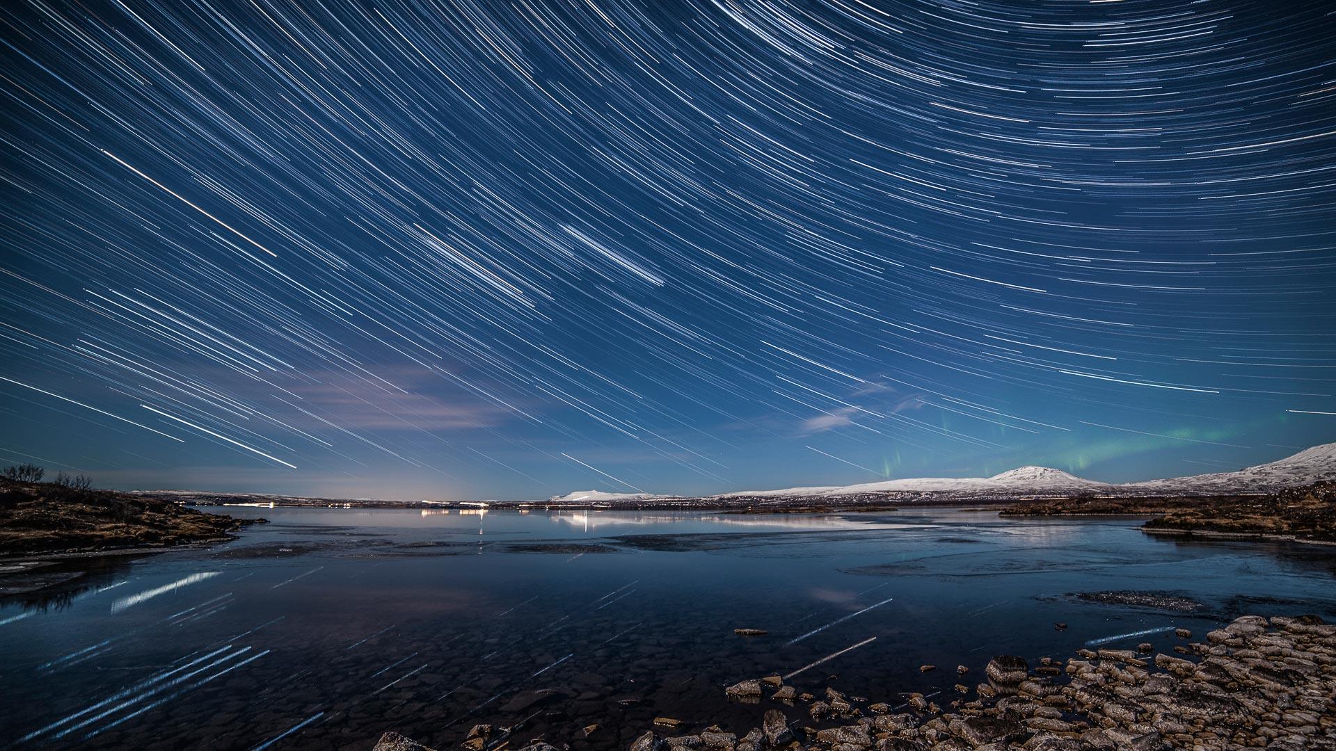 Stars trails and aurora borealis over Þingvellir Thingvellir