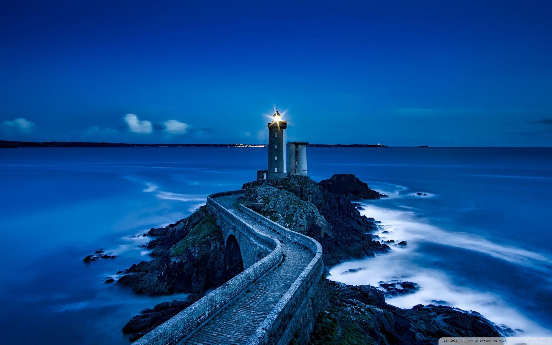 Lighthouse at Night Wallpaper