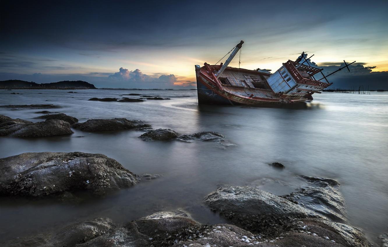 Wallpaper sunset, stones, shore, ship, twilight, shipwreck image