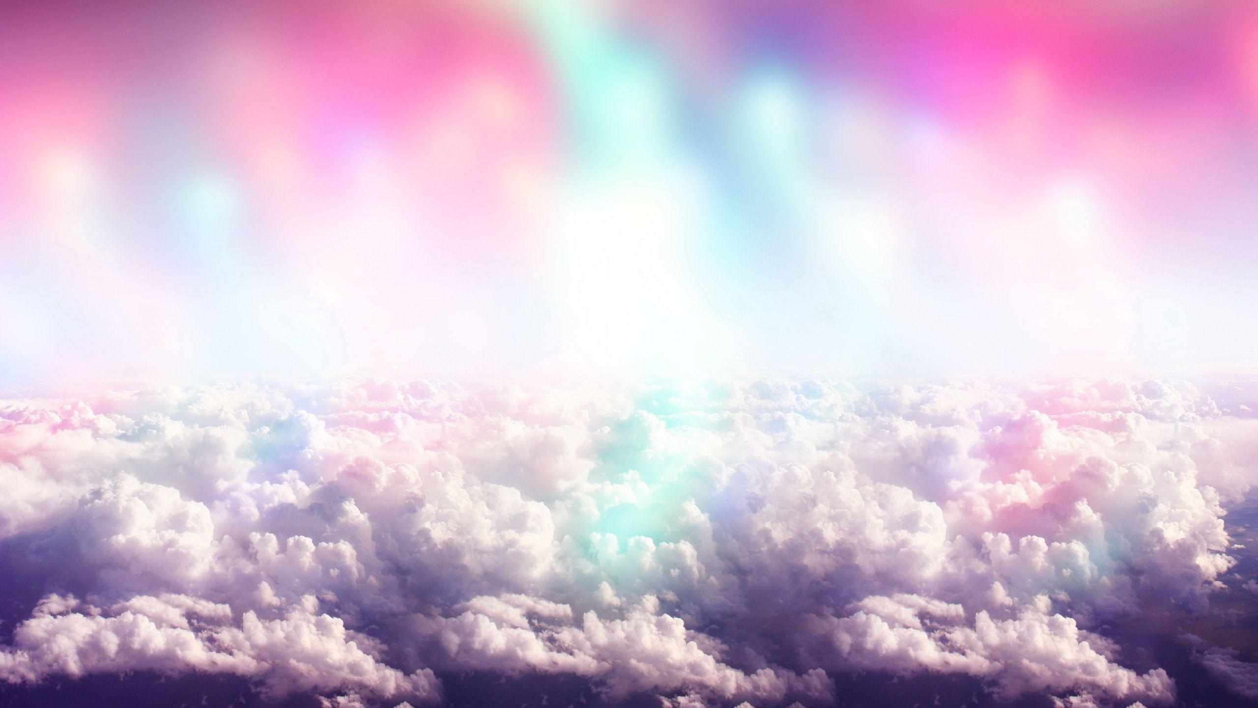 Rainbow colors above the white clouds Wallpaper