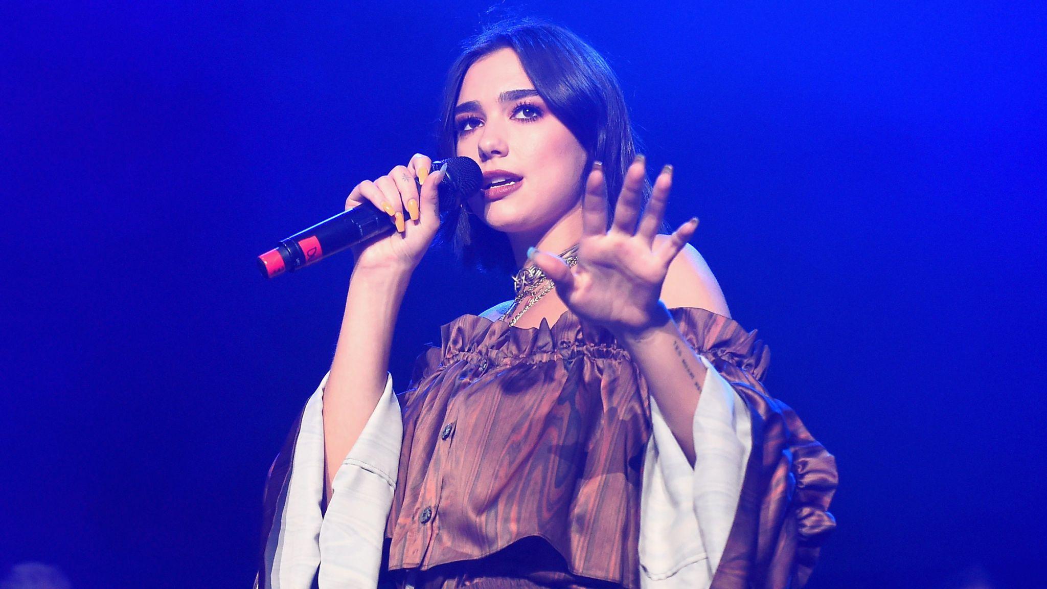 Dua Lipa fans forcibly removed from Shanghai concert for 'waving