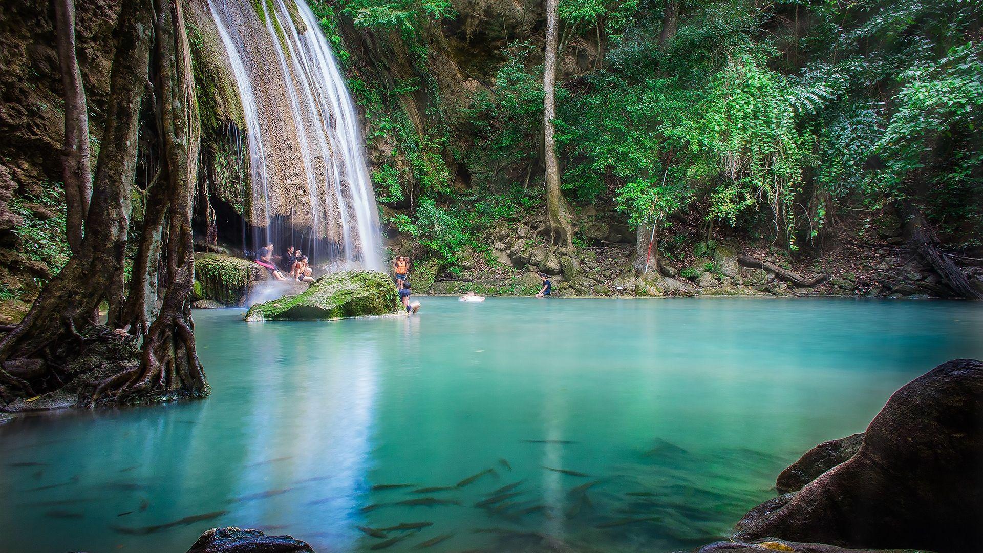 Summer Water Play by People in Erawan National Park Thailand