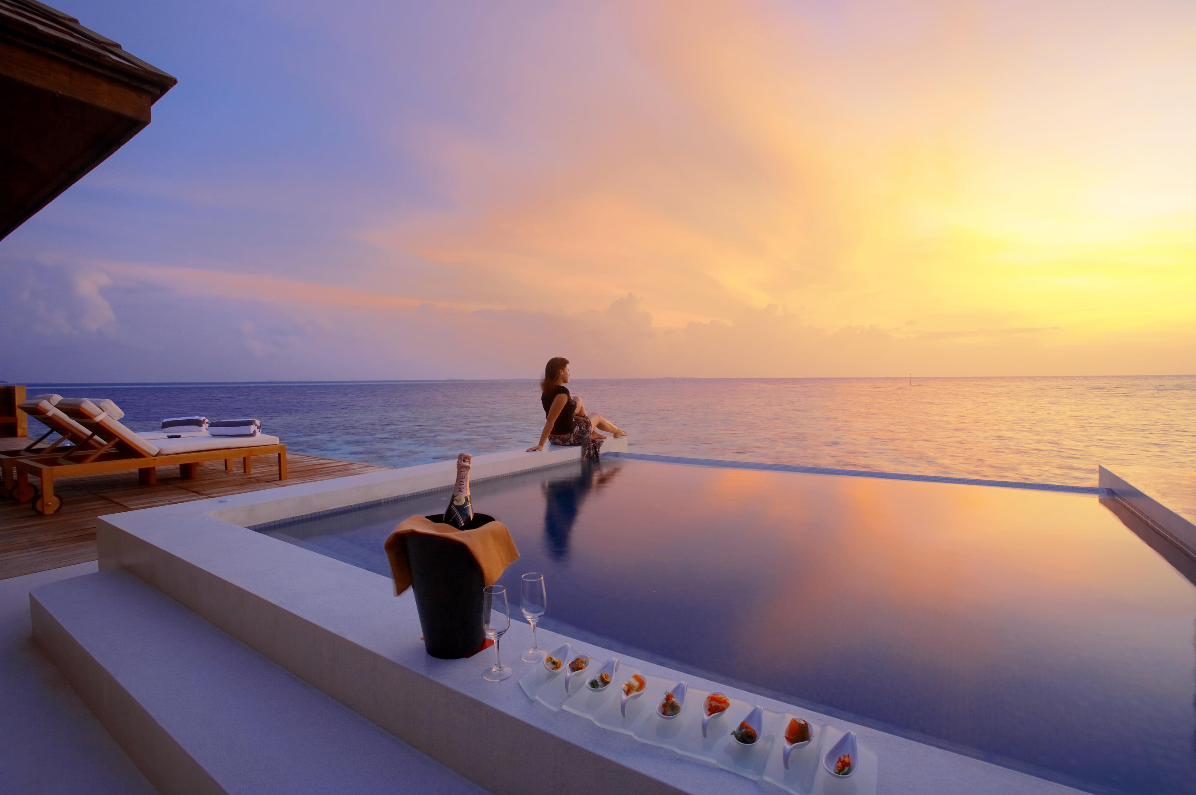 Infinity Pool during sunset HD wallpaper