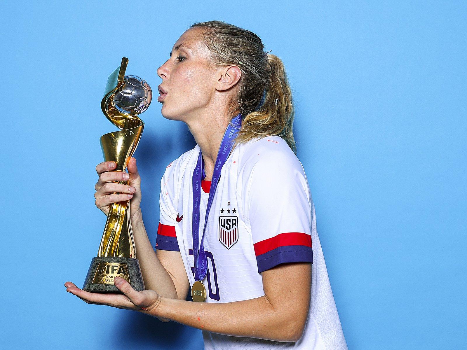 USWNT wins Women's World Cup: Players pose with trophy
