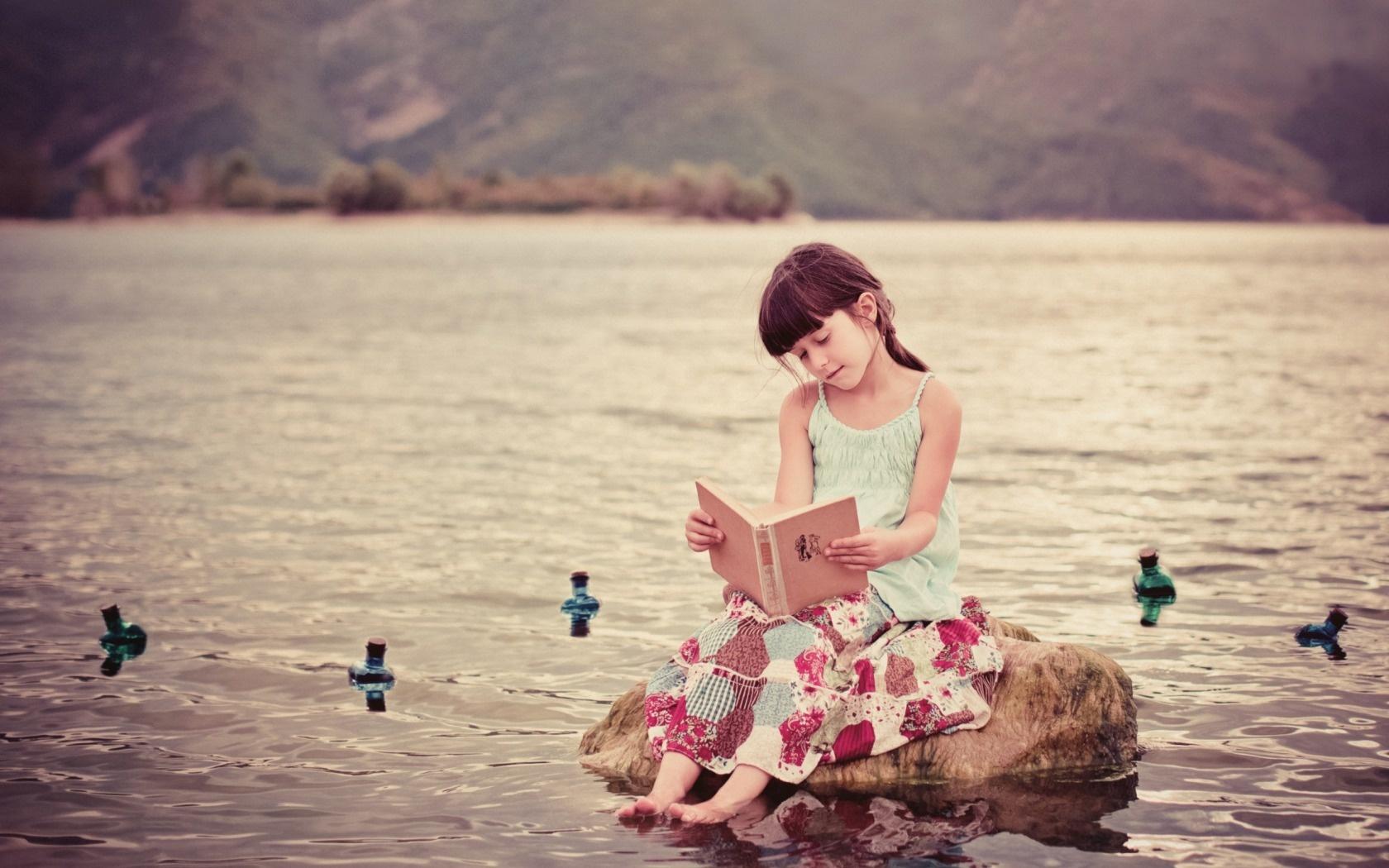 Cute Girl Reading Book Wallpaper