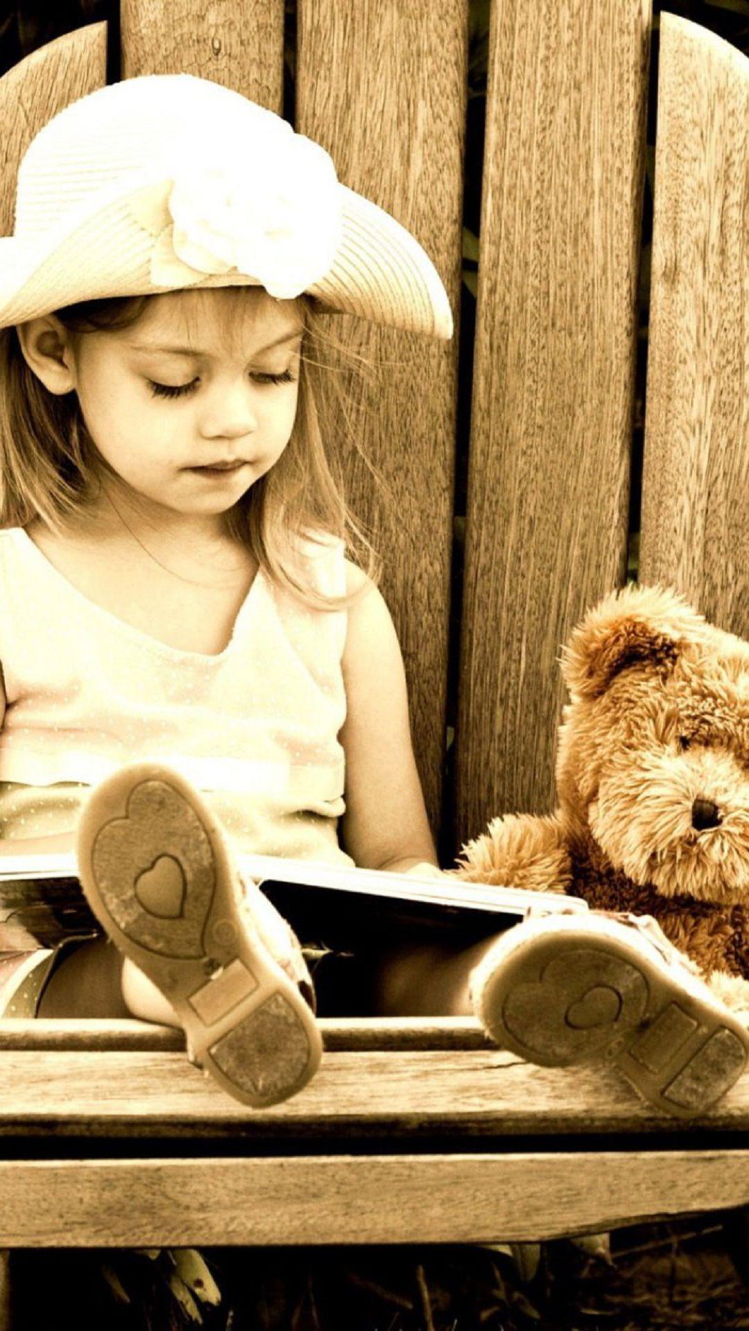Young Girl Reading A Book Teddy Bear Android Wallpaper free download